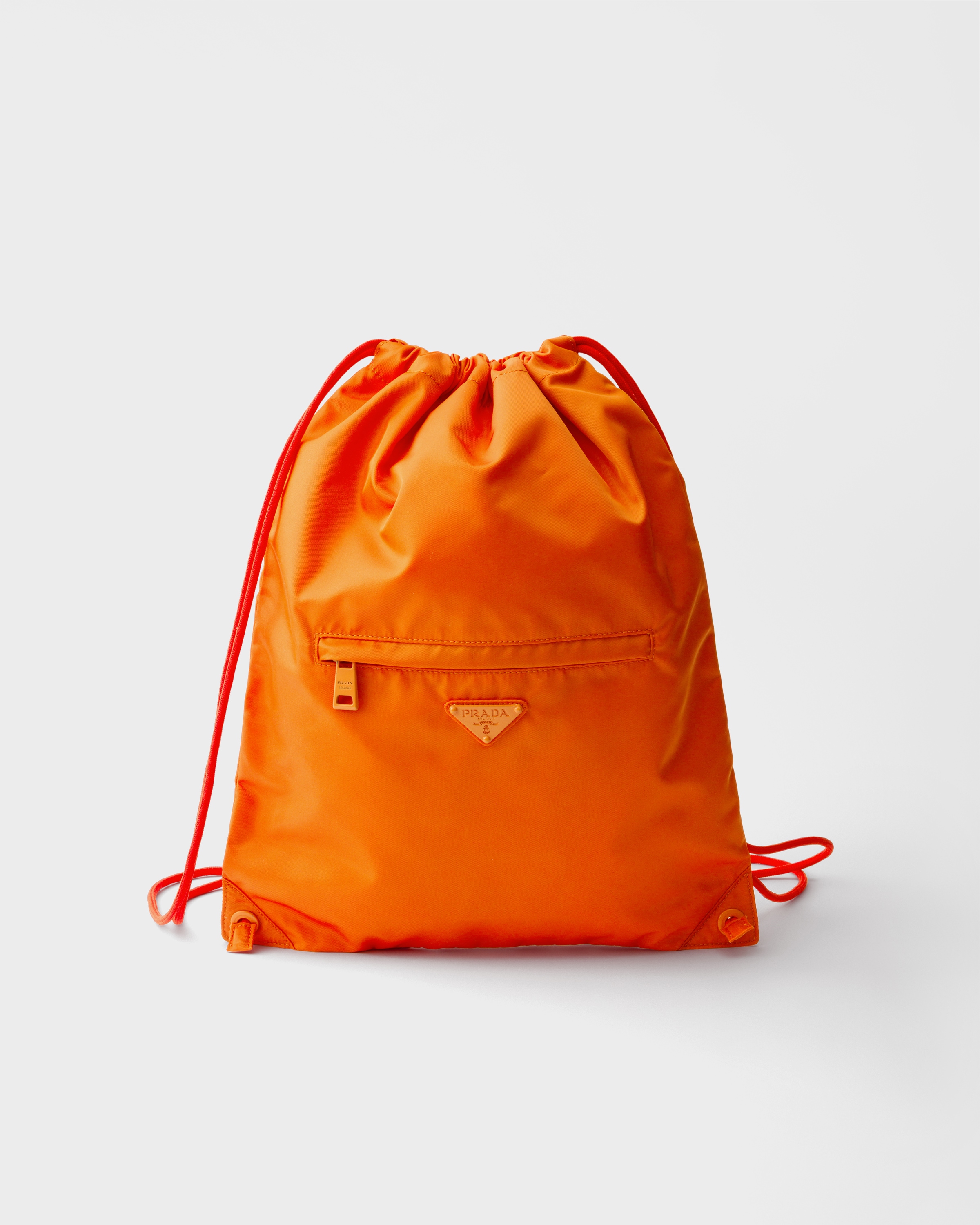 ゆ*ゆ様 PRADA オレンジ ナイロンドローストリングバッグ Orange Re-Nylon drawstring backpack | PRADA - United States