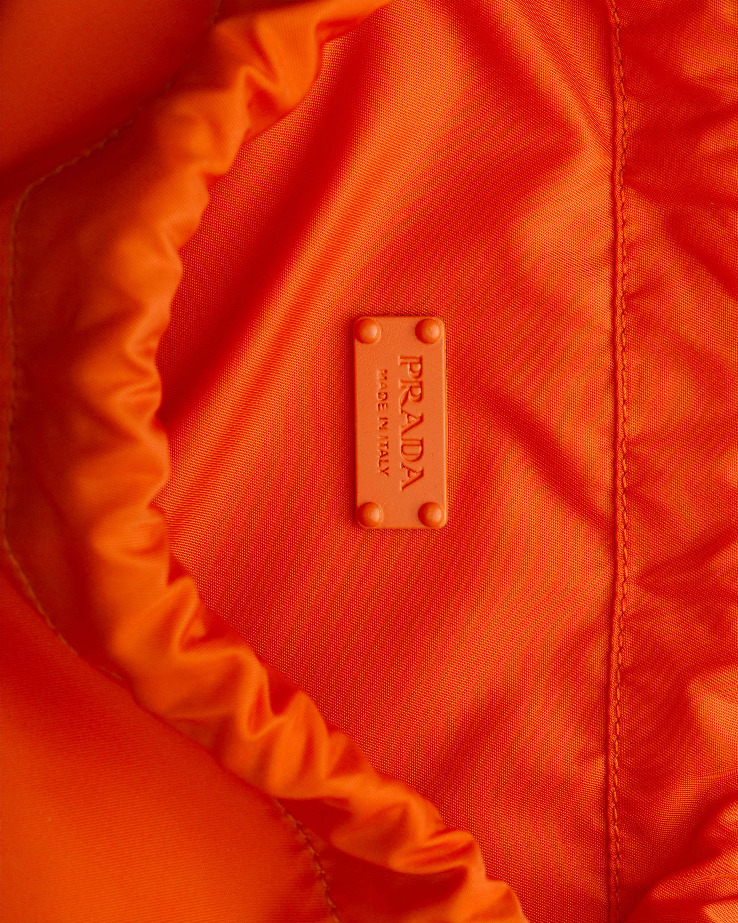 ゆ*ゆ様 PRADA オレンジ ナイロンドローストリングバッグ Orange Re-Nylon drawstring backpack | PRADA - United States