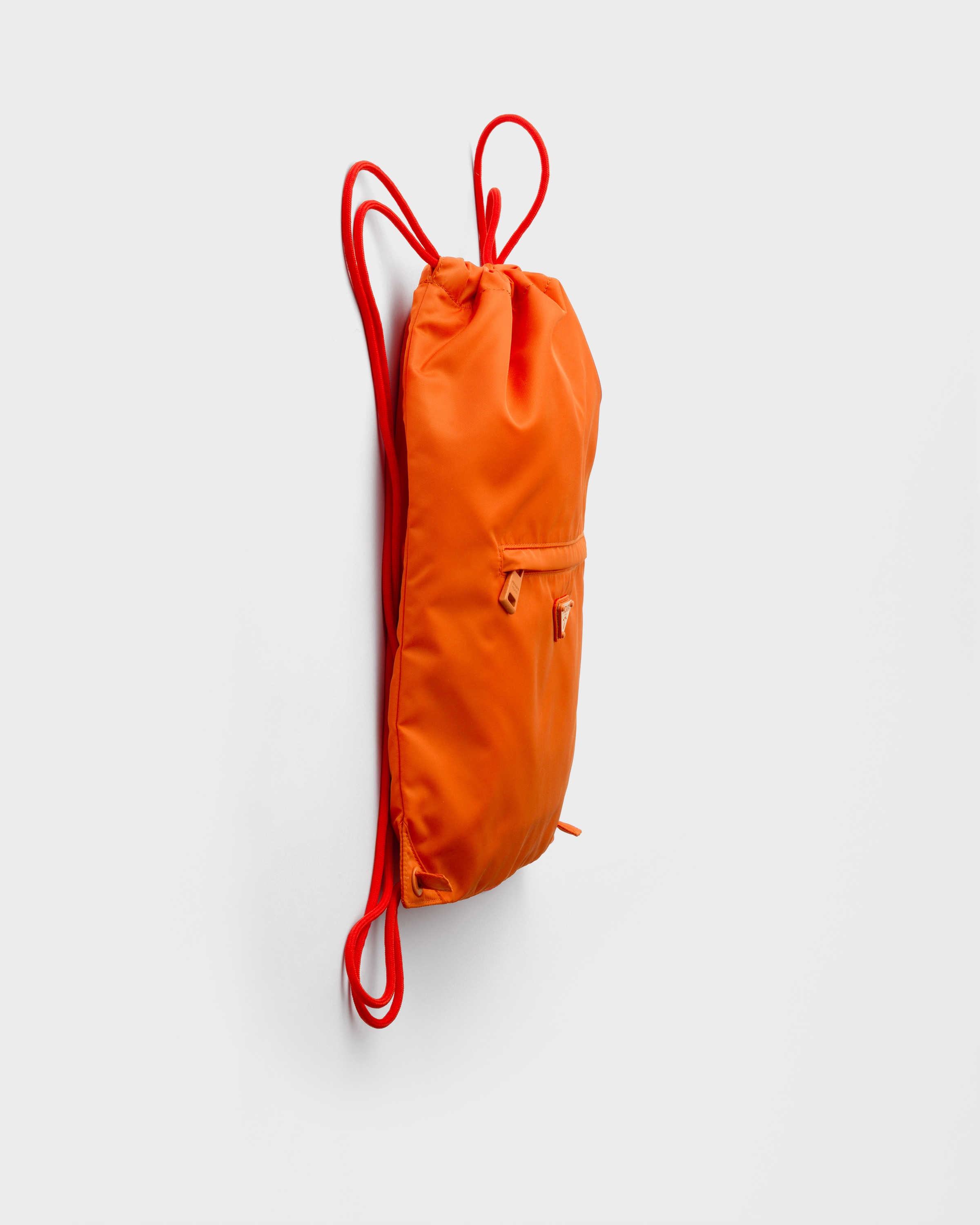 オレンジ Re-Nylon ドローストリング バックパック | PRADA - 日本
