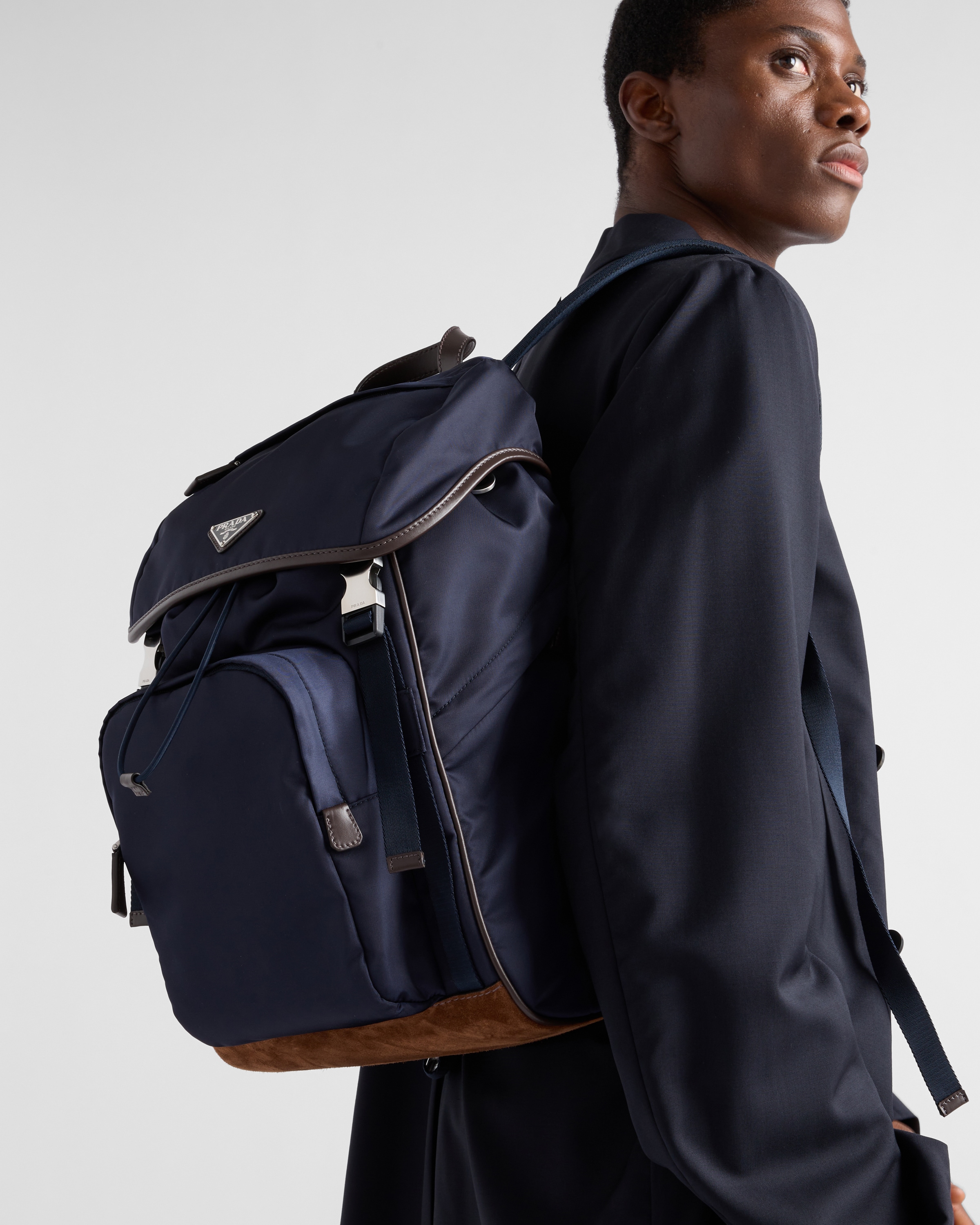 Prada Structured Leather Backpack With Logo Zipper Closure In Blue/coffee