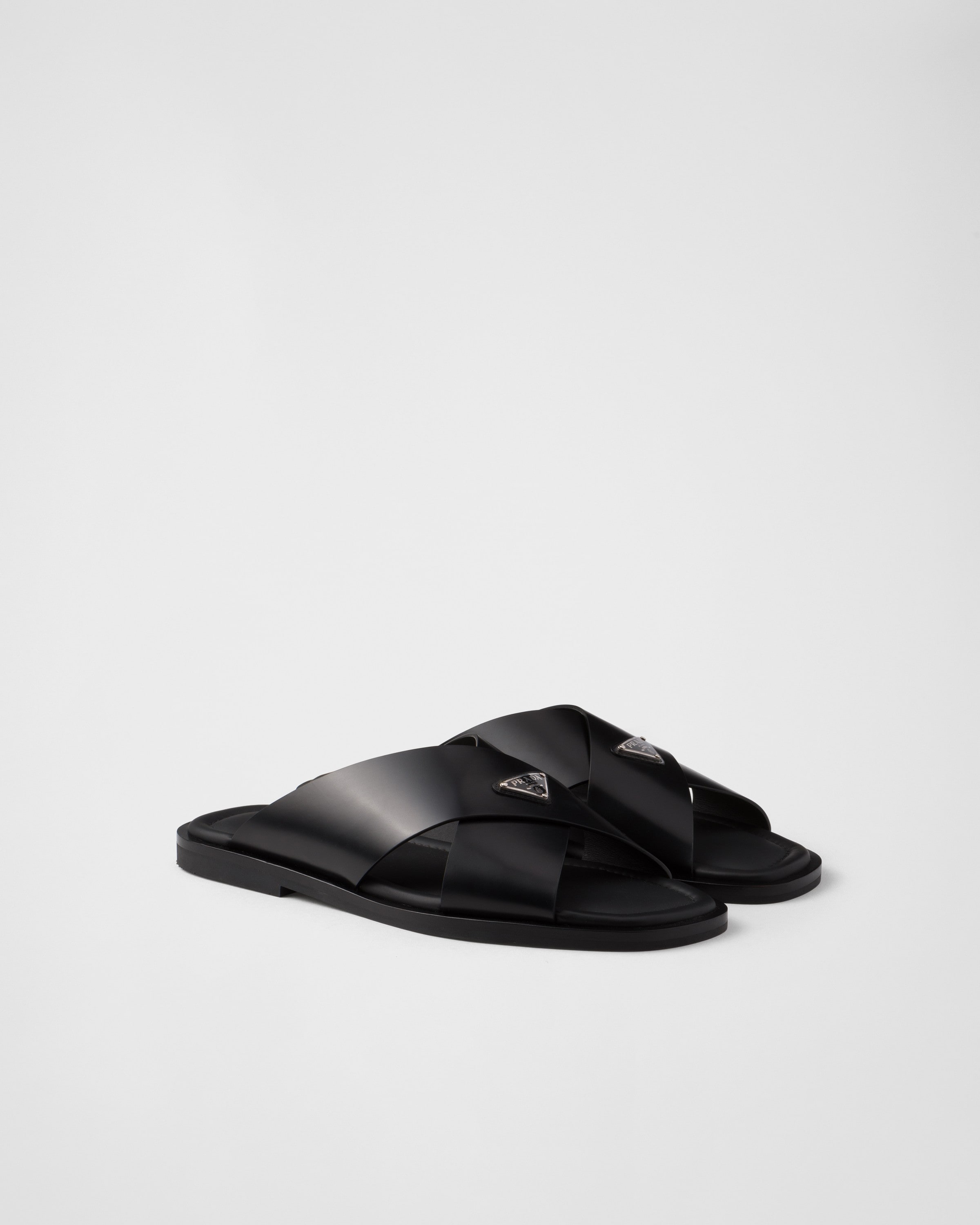 Prada Brushed Leather Crisscross Slides In Brown