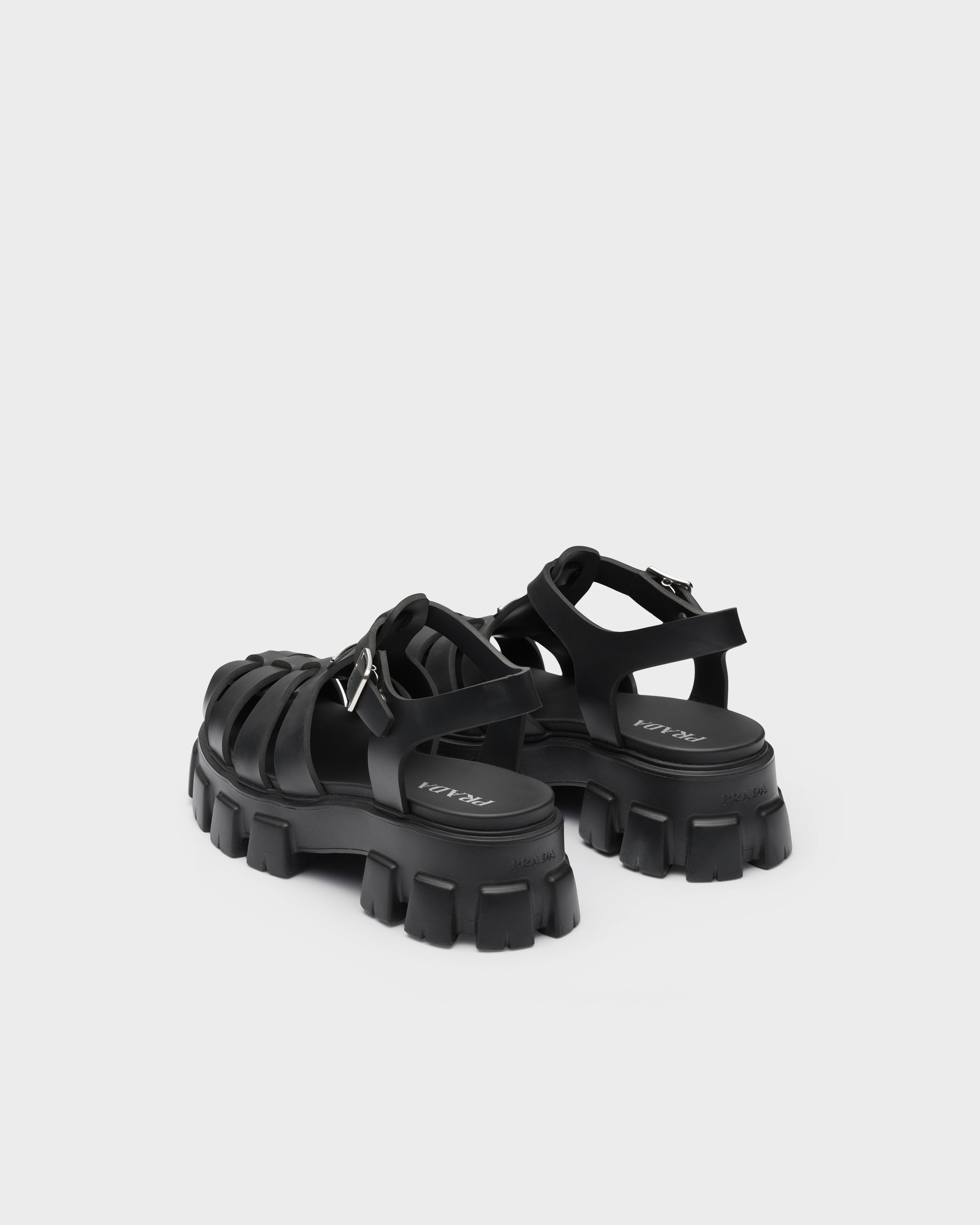 ブラック プラダ モノリス ラバー サンダル | PRADA - 日本