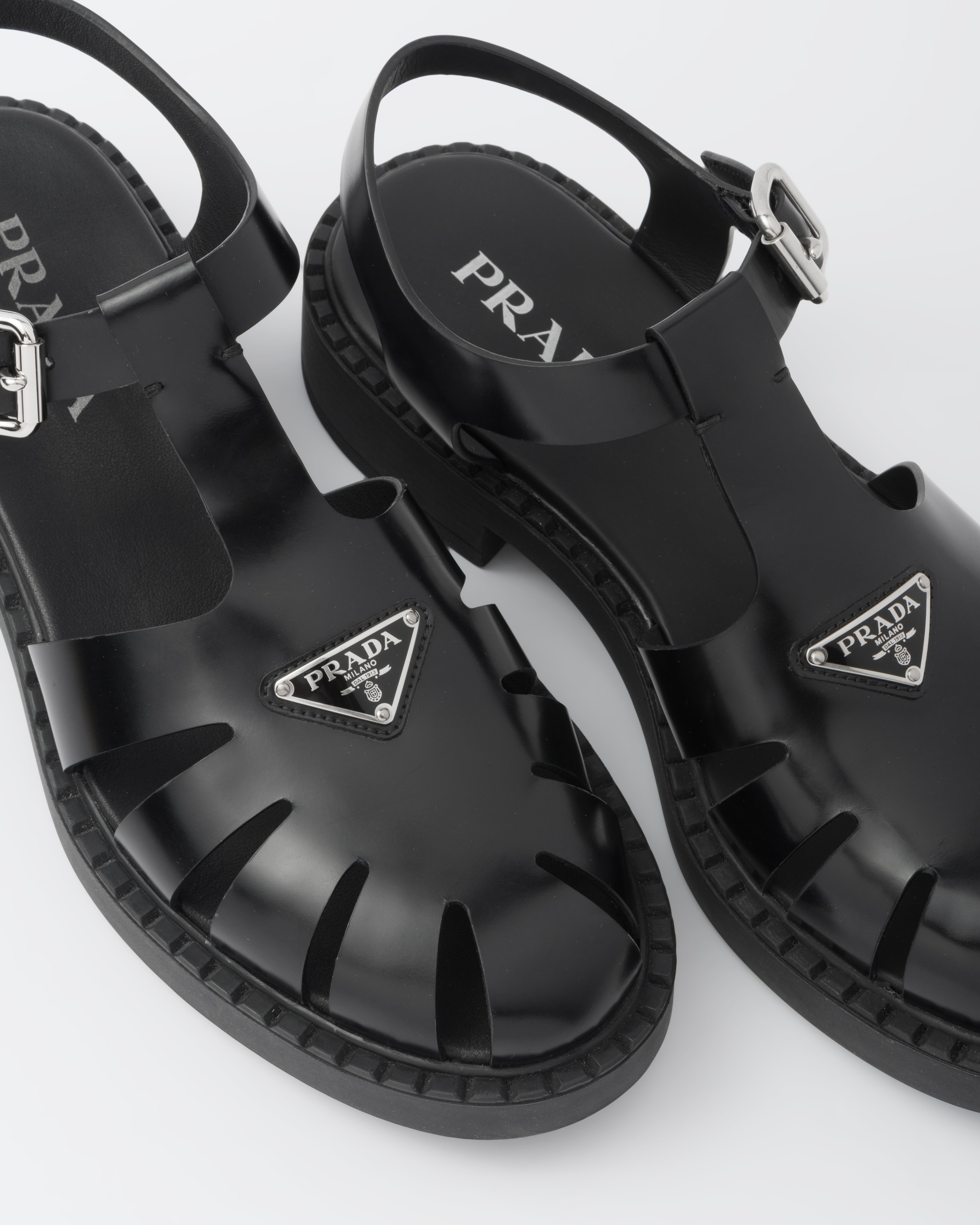 Black Brushed leather fisherman sandals | Prada