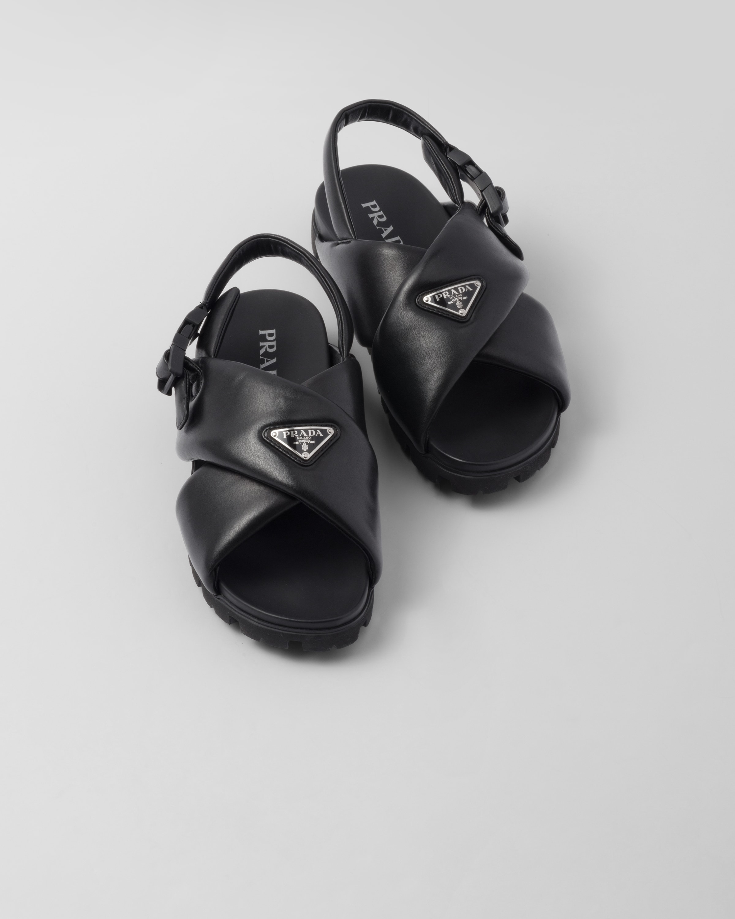 Black Padded nappa leather crisscross sandals | Prada