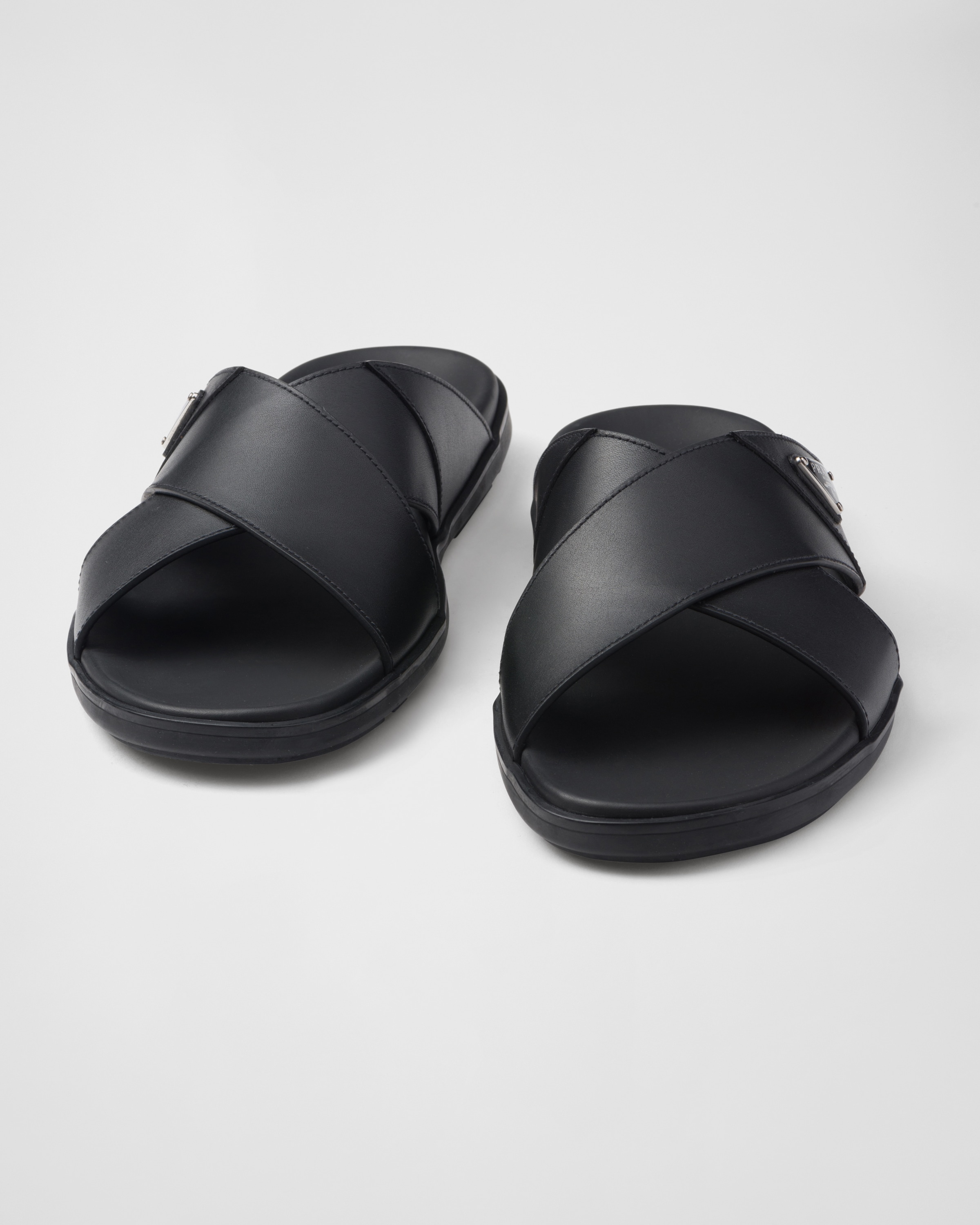 Black Leather crisscross slides | PRADA