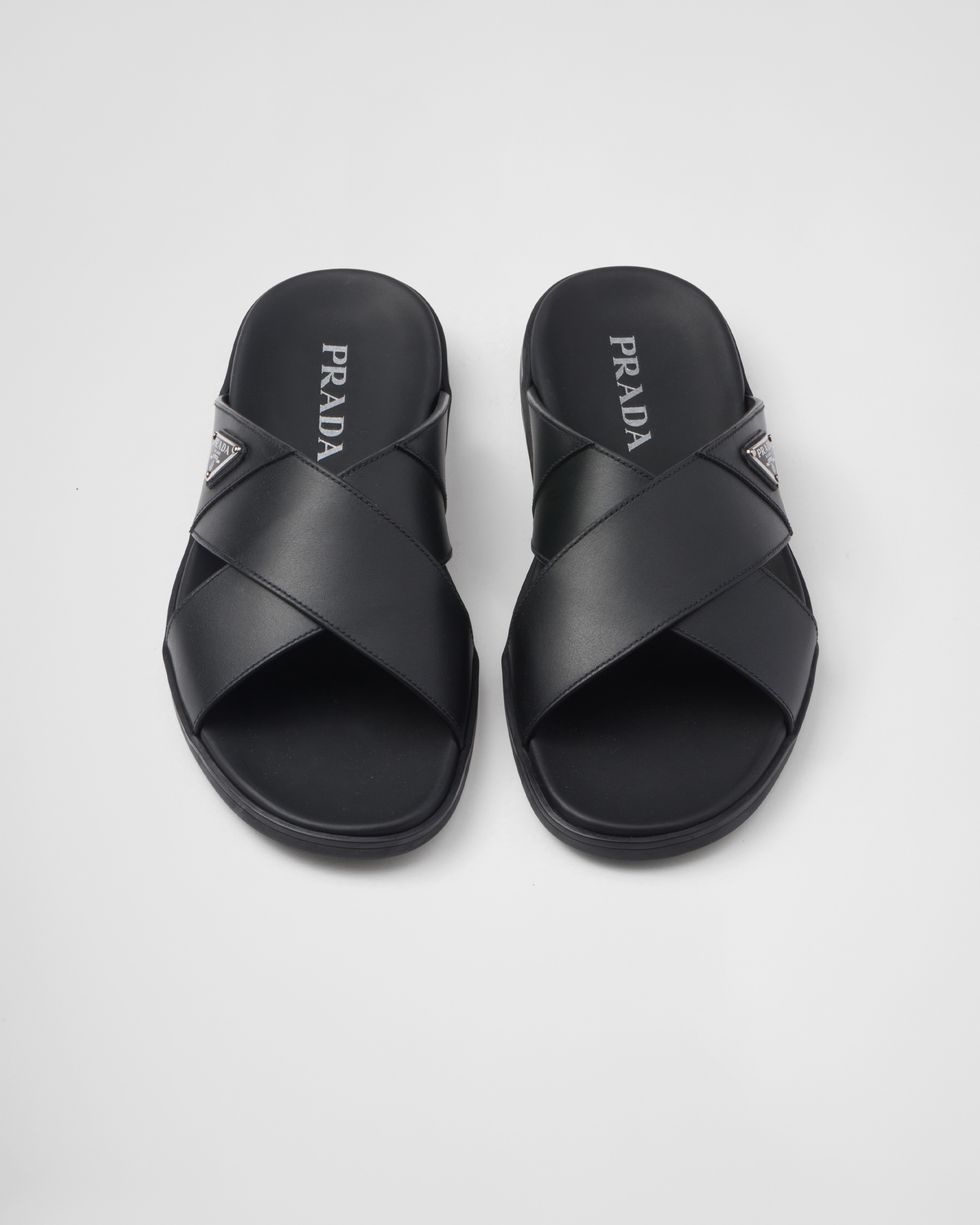 Black Leather crisscross slides | PRADA Black Leather crisscross slides | PRADA