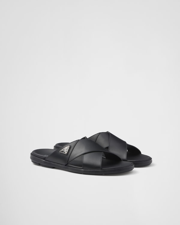 Black Decò leather crisscross sandals | PRADA