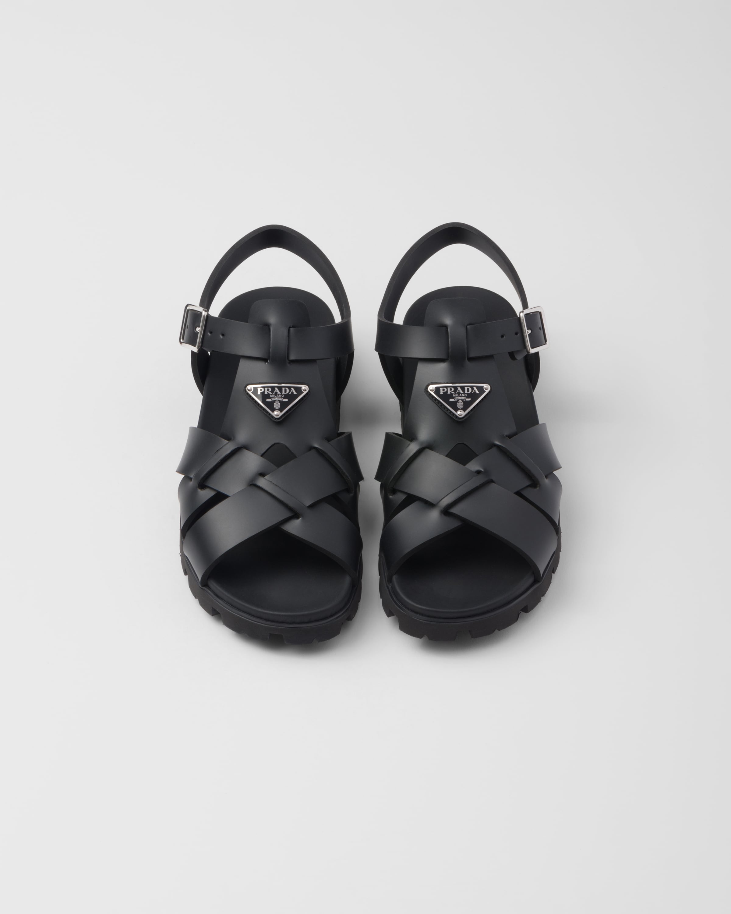 Shop Prada Crisscross Rubber Sandals In Black