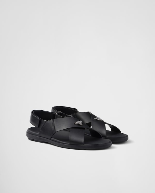 Black Decò leather crisscross sandals | PRADA