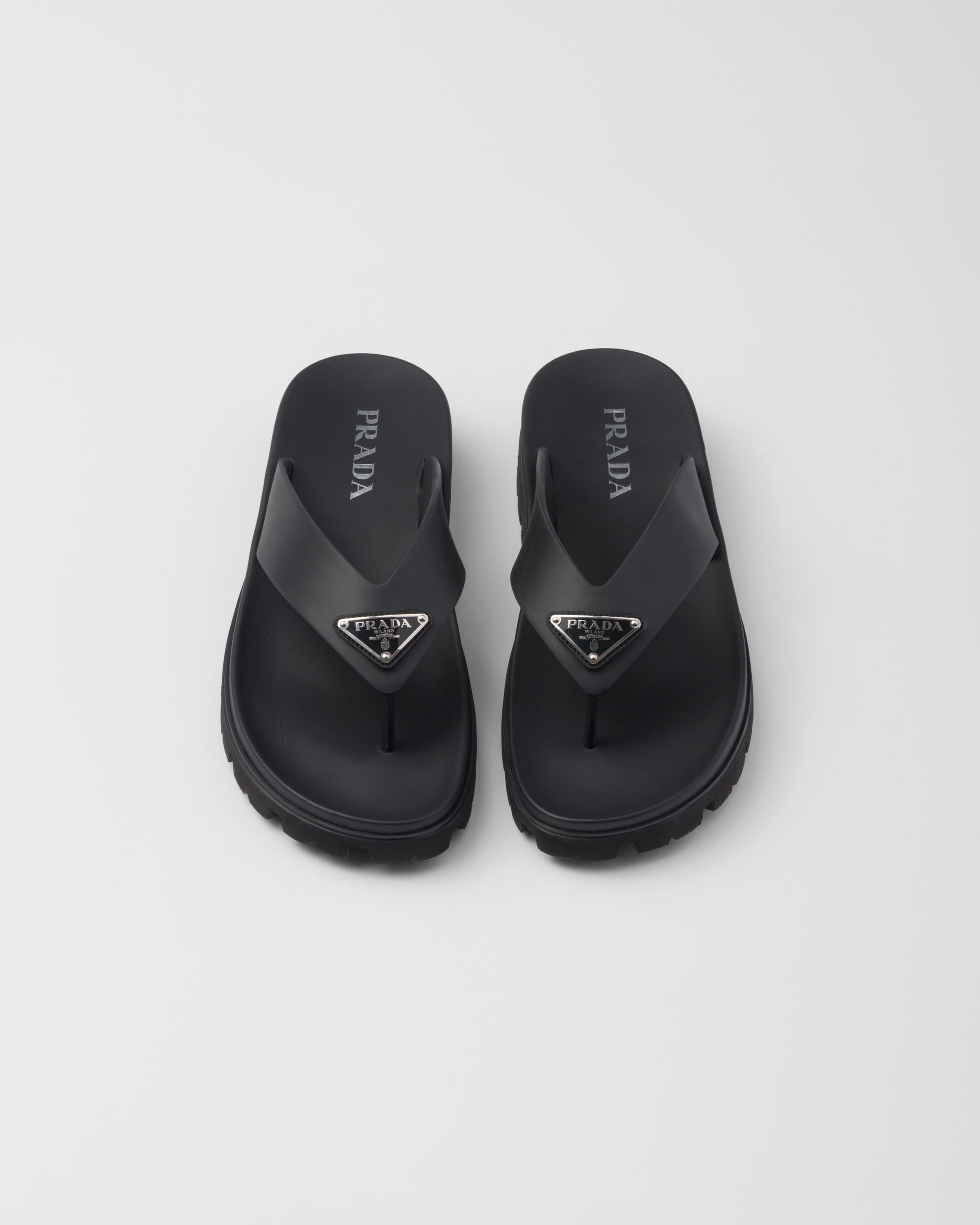 Shop Prada Zehensteg-sandalen Aus Gummi In Black