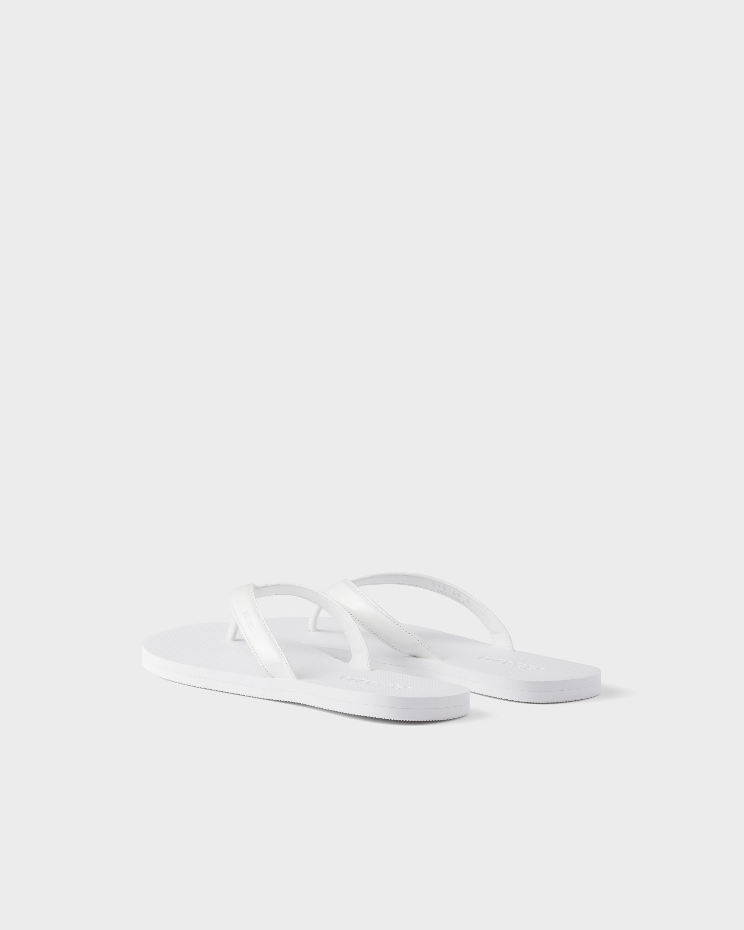 White Brushed leather flip-flops | PRADA - Netherlands