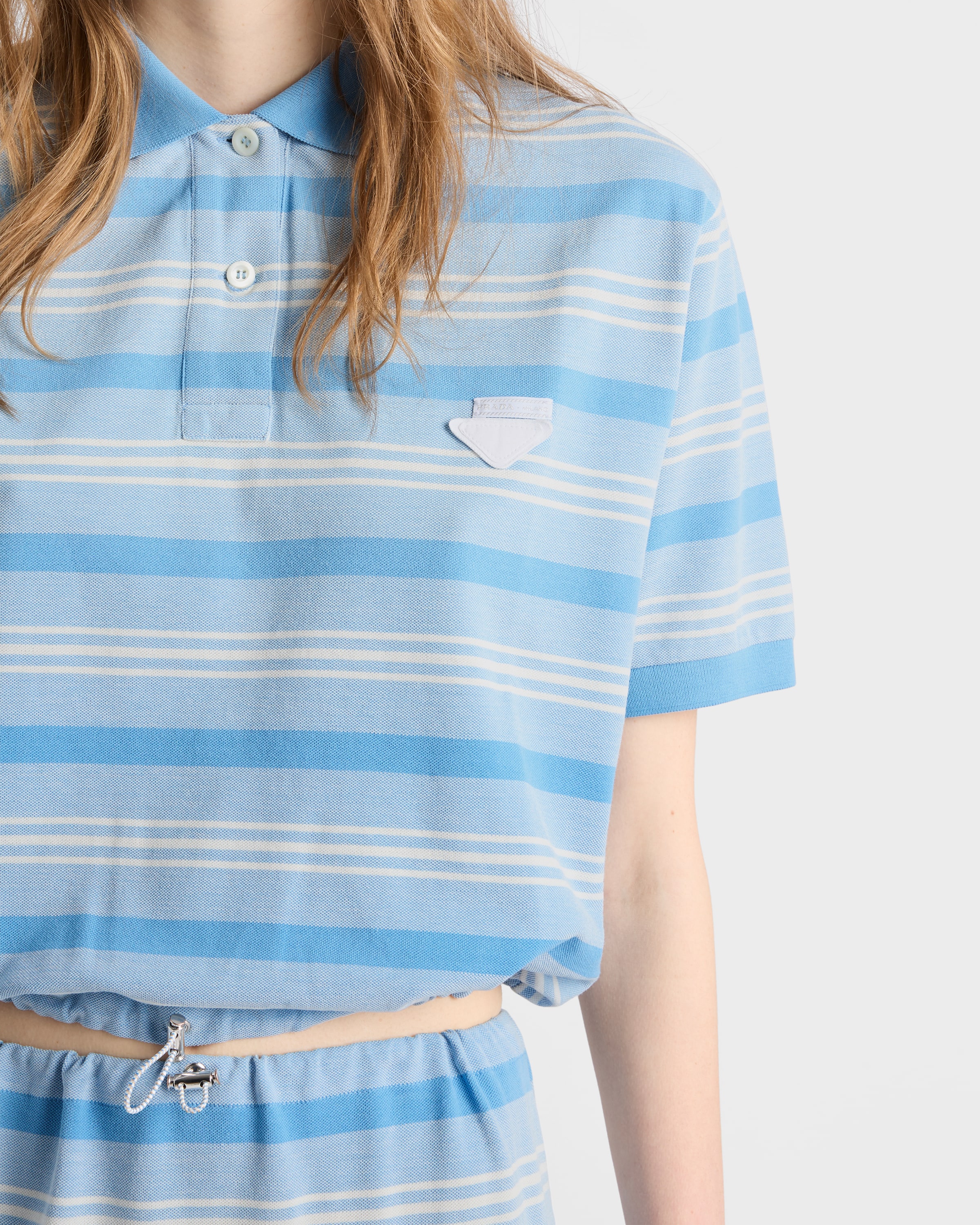 PRADA 青と白のストライプ ポロシャツ Light Blue Striped Print Piqué Polo Shirt | PRADA