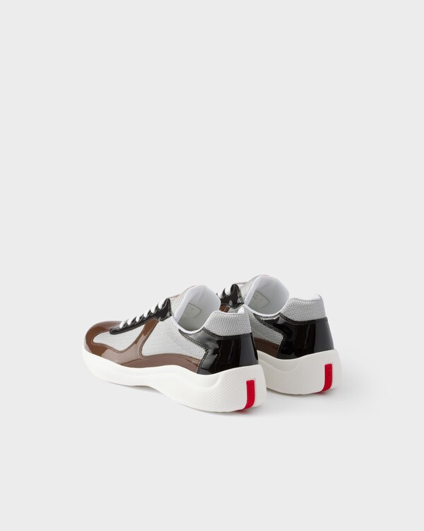 Patent leather and technical fabric Prada America's Cup sneakers - Rosewood/Ebony Patent leather and technical fabric Prada America's Cup sneakers - Rosewood/Ebony
