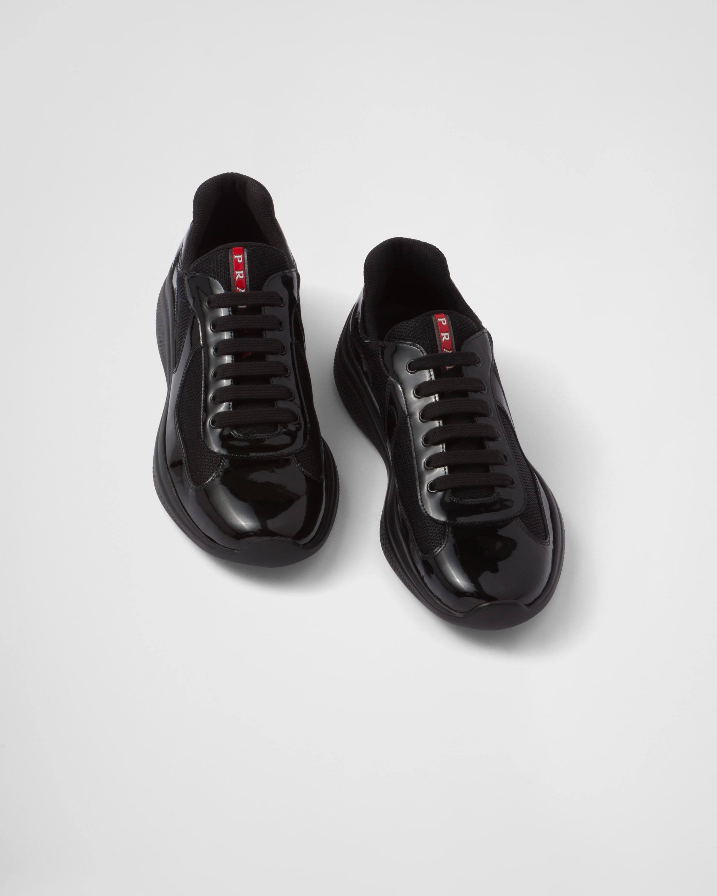 Prada patent top sneakers