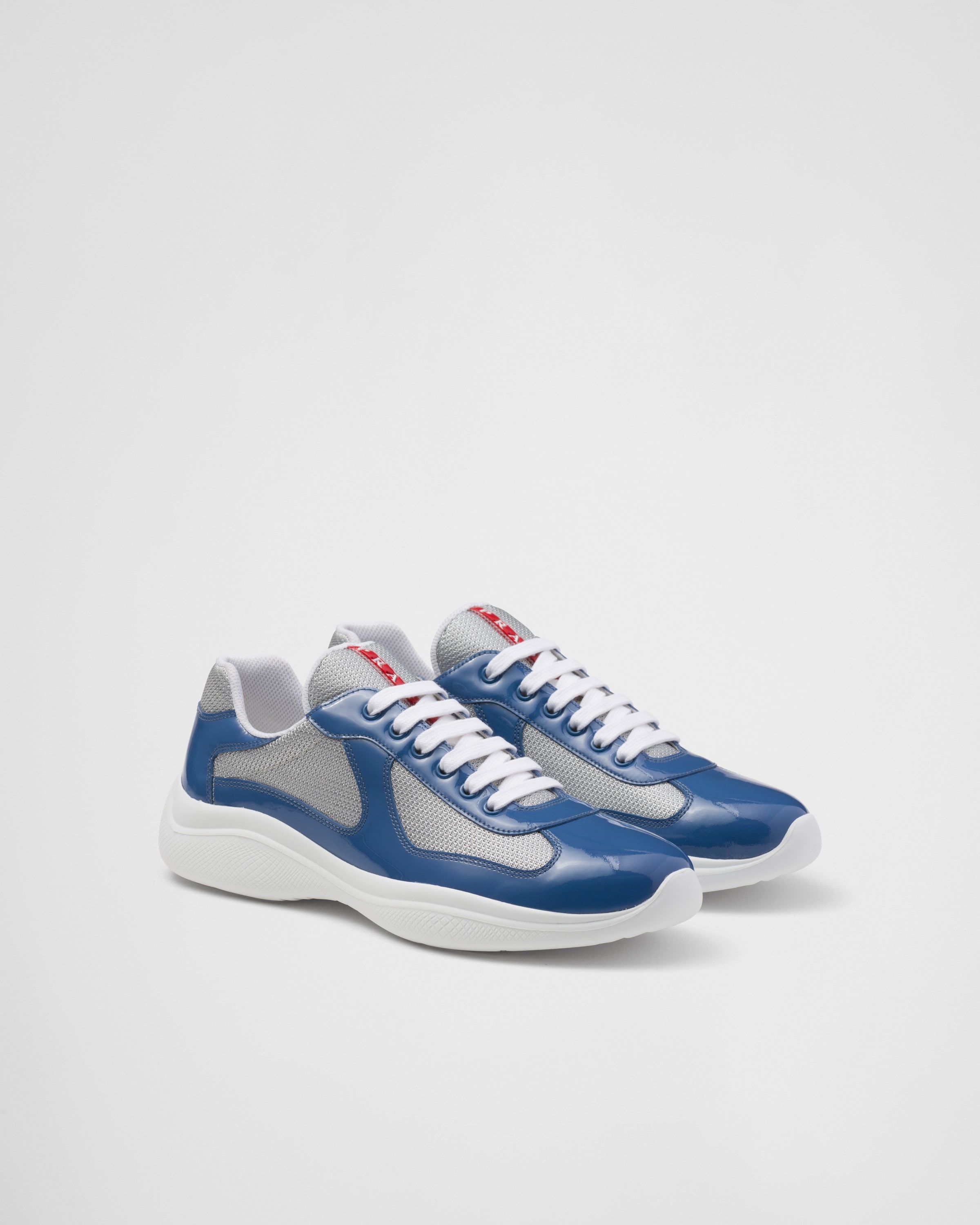 Prada America's Cup Sneaker Aus Lackleder Und Funktionsgewebe In Aviation Blue/silver