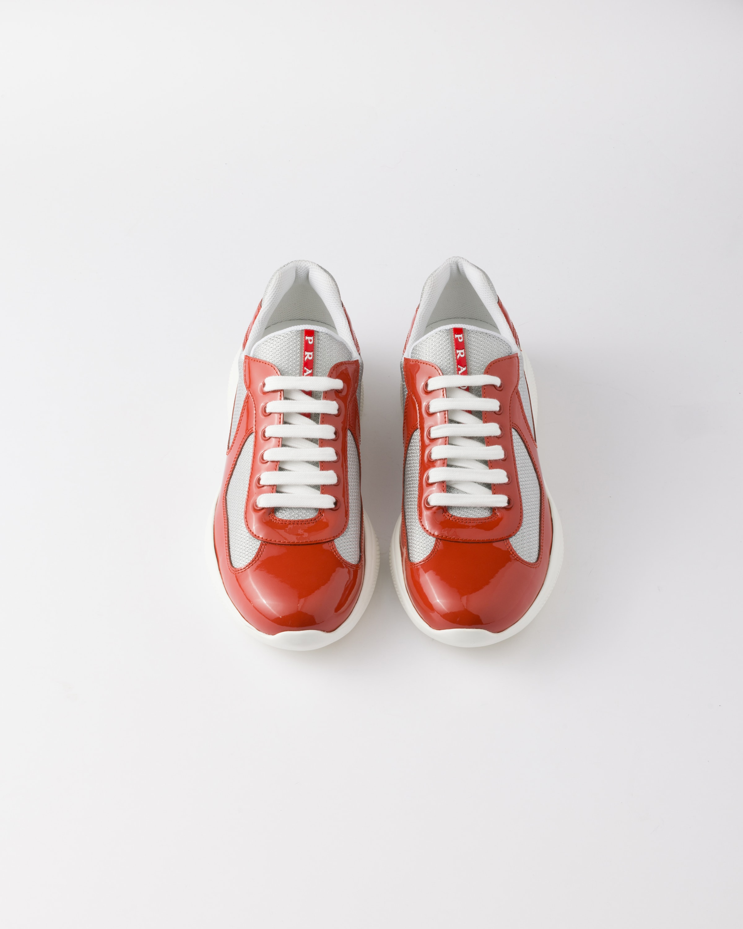 Prada Low Contrasting Panel Sneakers In Copper/silver