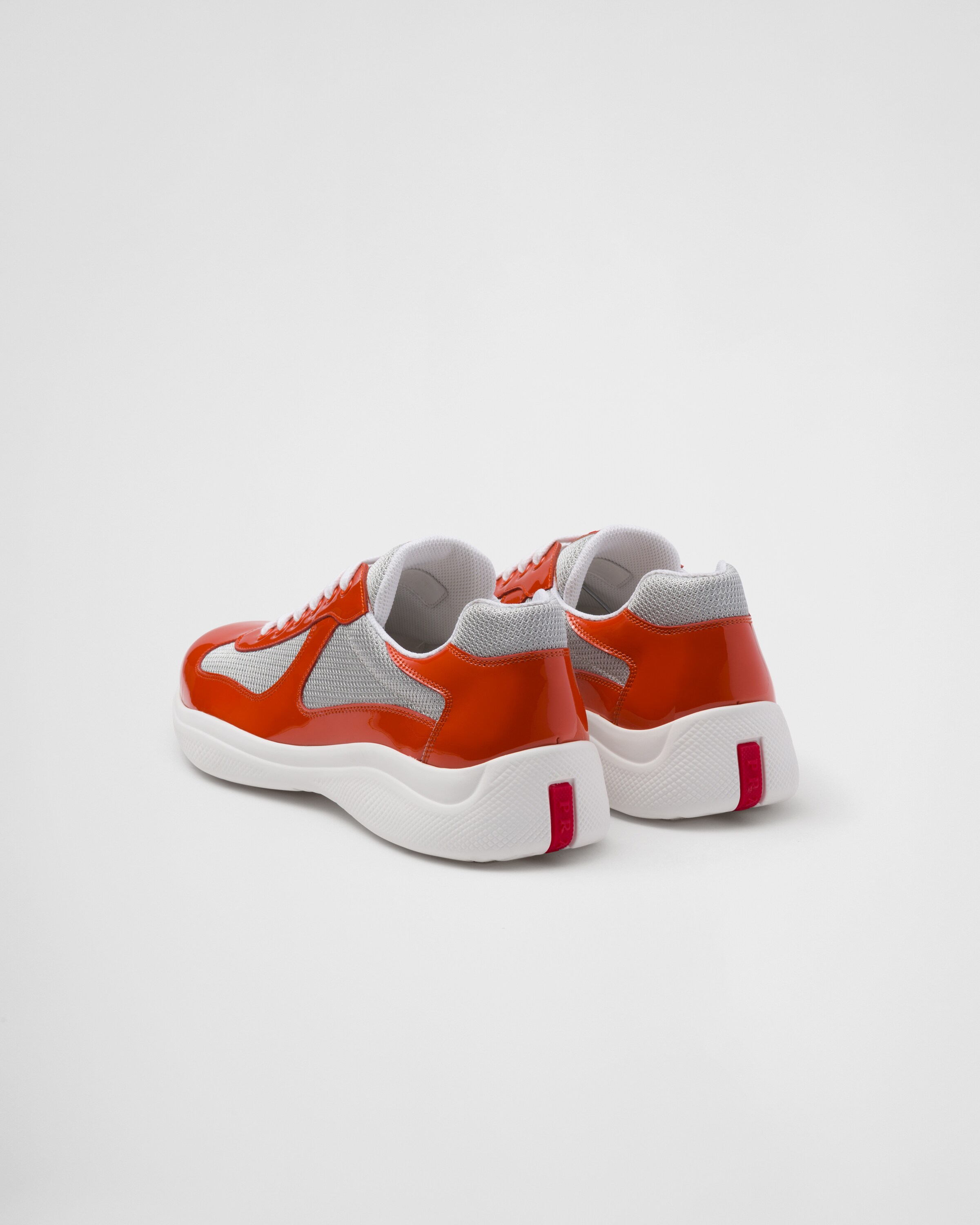 Prada on sale orange sneakers