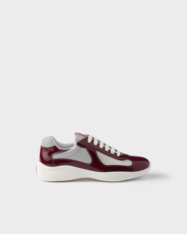 Prada America’s Cup Sneaker aus Lackleder und Funktionsgewebe - Weinrot-Silber Prada America’s Cup Sneaker aus Lackleder und Funktionsgewebe - Weinrot-Silber