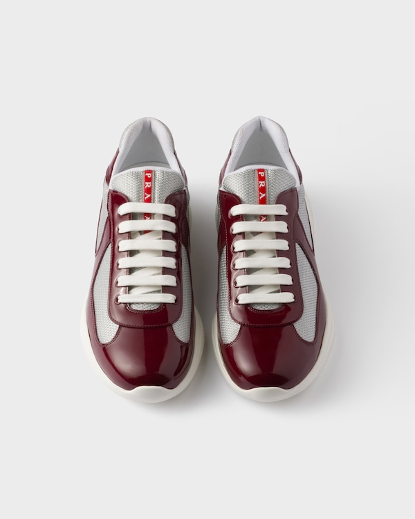 Prada America’s Cup Sneaker aus Lackleder und Funktionsgewebe - Weinrot-Silber Prada America’s Cup Sneaker aus Lackleder und Funktionsgewebe - Weinrot-Silber