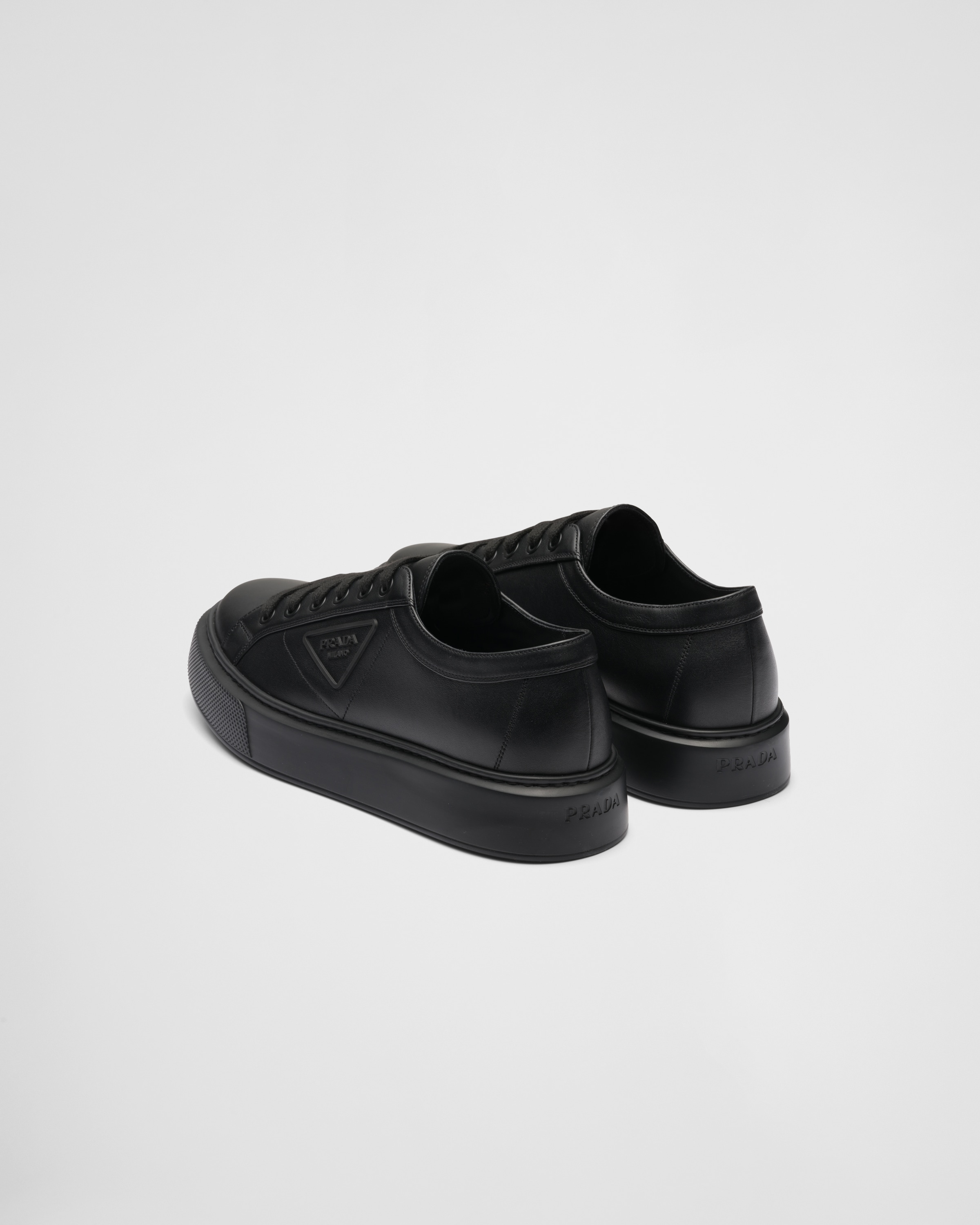 black leather prada sneakers