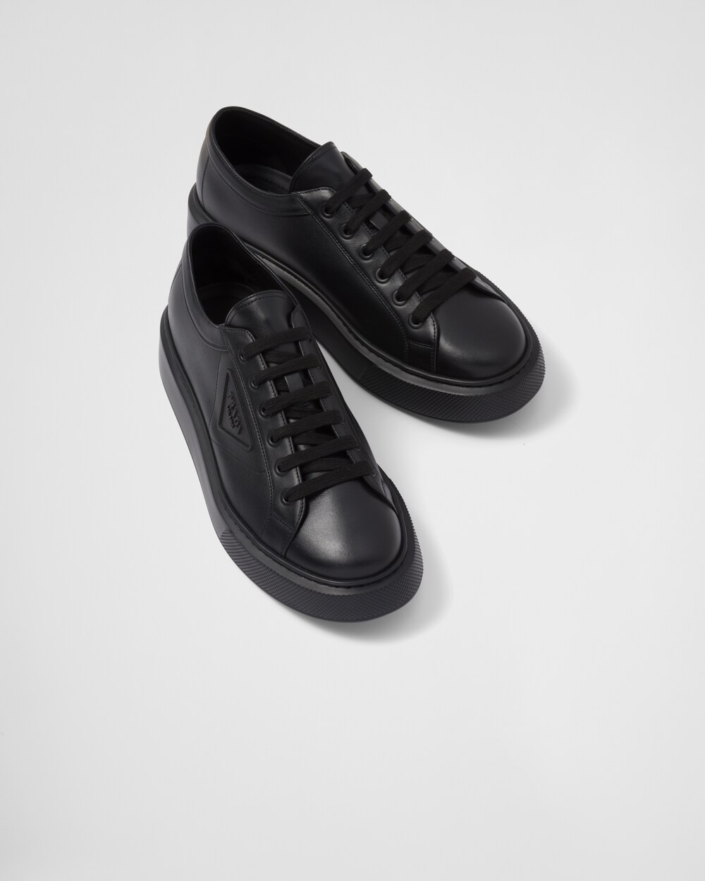 black leather prada sneakers
