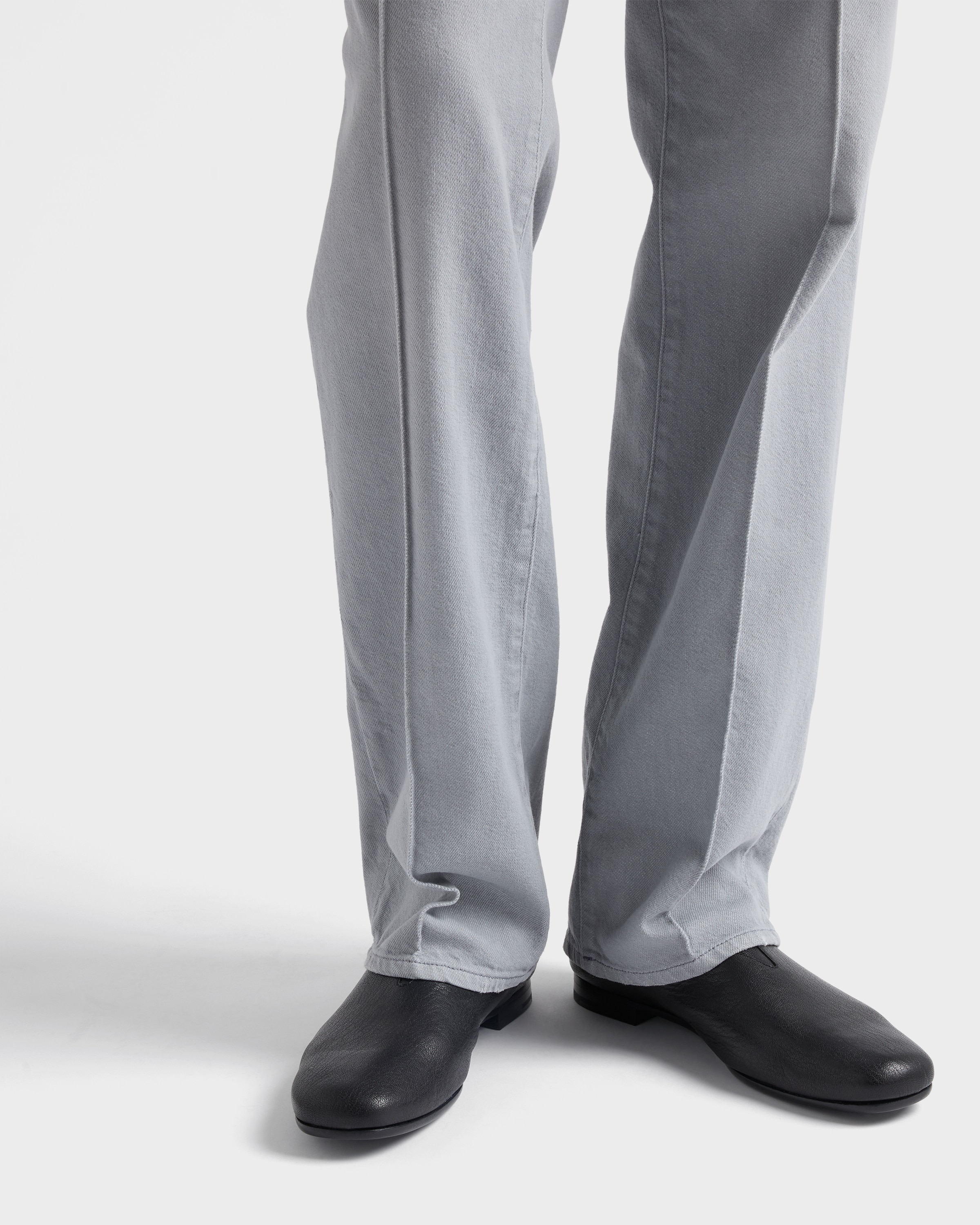 Five-pocket washed denim jeans