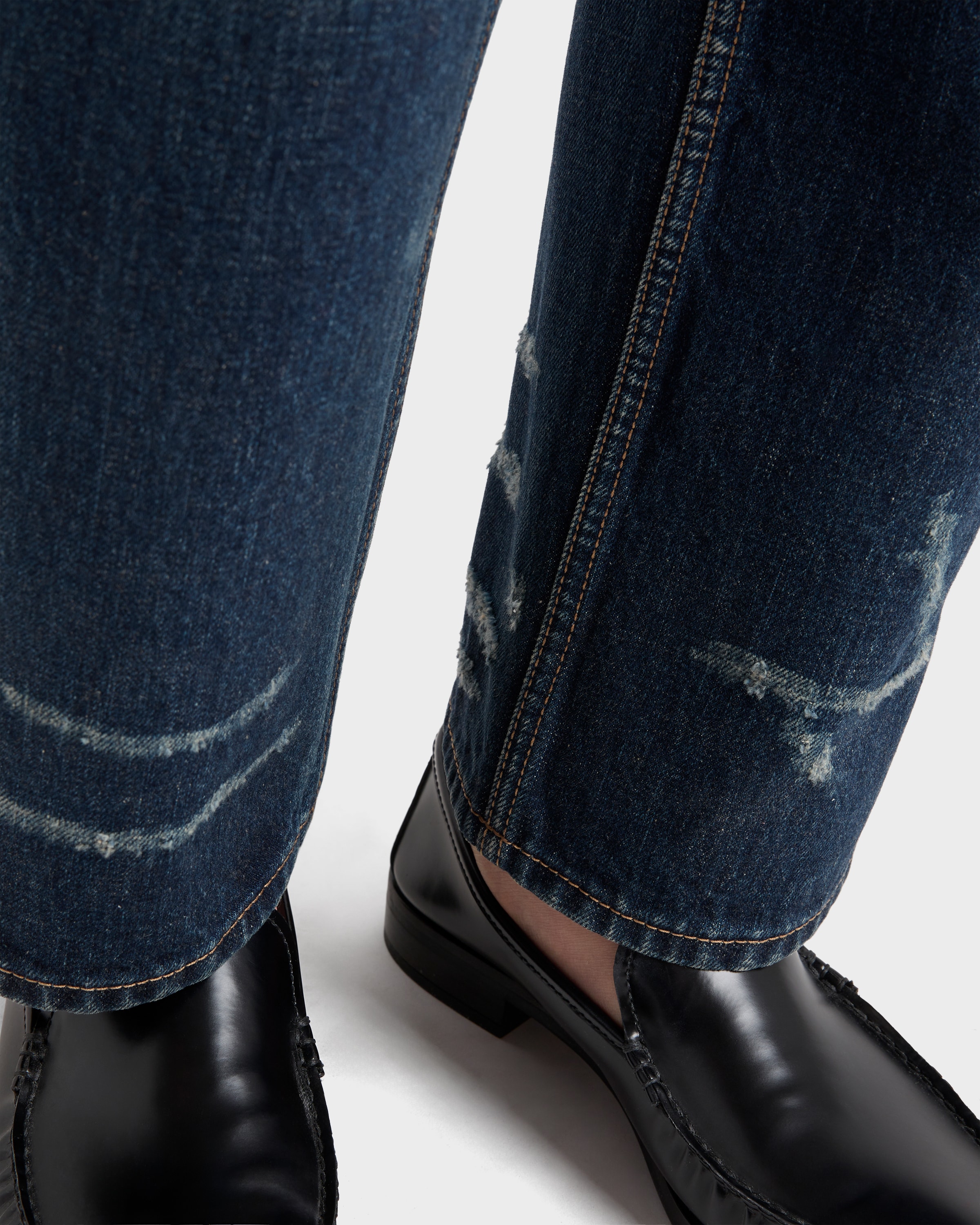 Five-pocket washed denim jeans