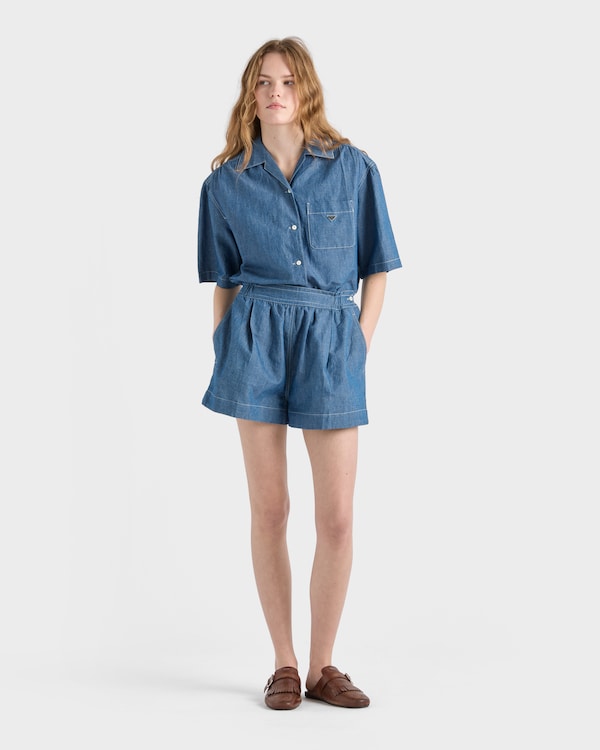 Mono de tejido vaquero de cambray - Azul Claro Mono de tejido vaquero de cambray - Azul Claro