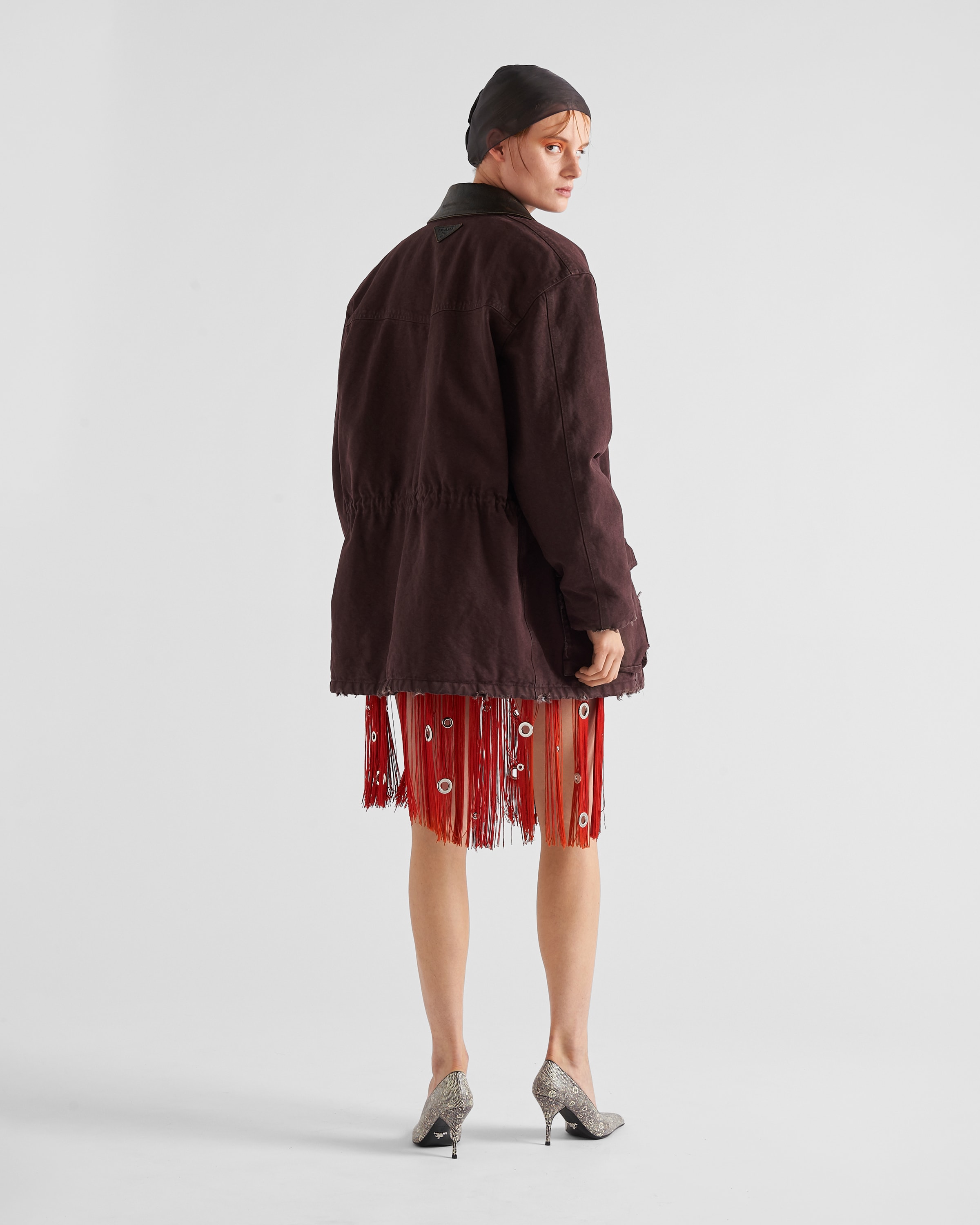 Red Midi-skirt with fringe and grommet embellishment | PRADA