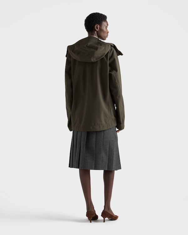 Pleated hopsack and technical fabric skirt Pleated hopsack and technical fabric skirt