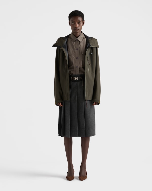 Pleated hopsack and technical fabric skirt Pleated hopsack and technical fabric skirt