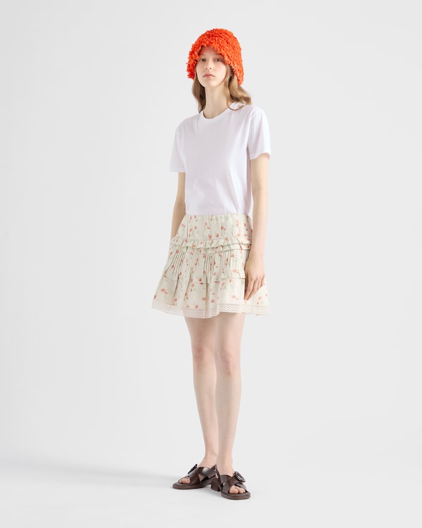 Jupe courte en lin à imprimé fleurs Jupe courte en lin à imprimé fleurs