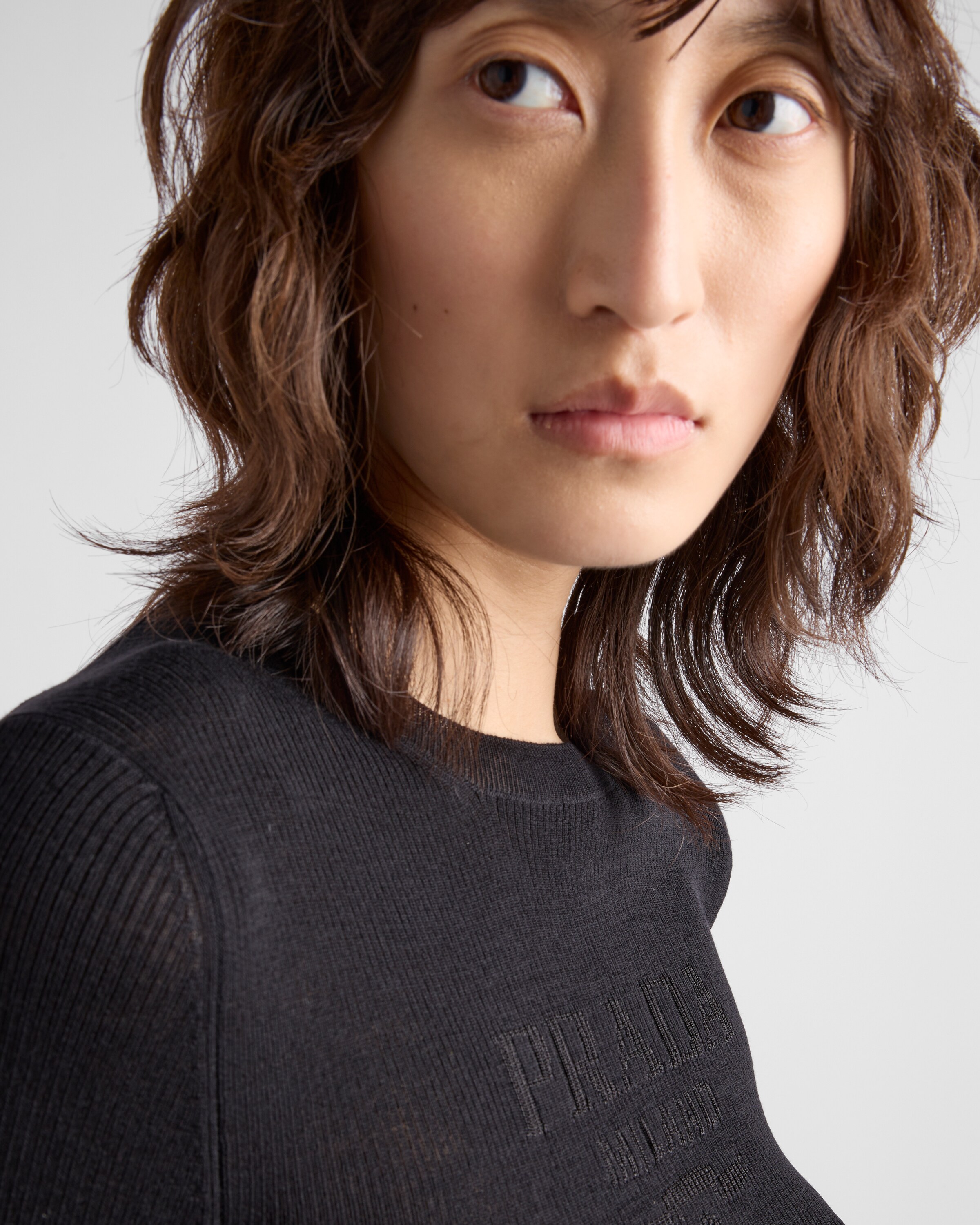Prada Rundhalspullover Aus Superfine-wool In Schwarz