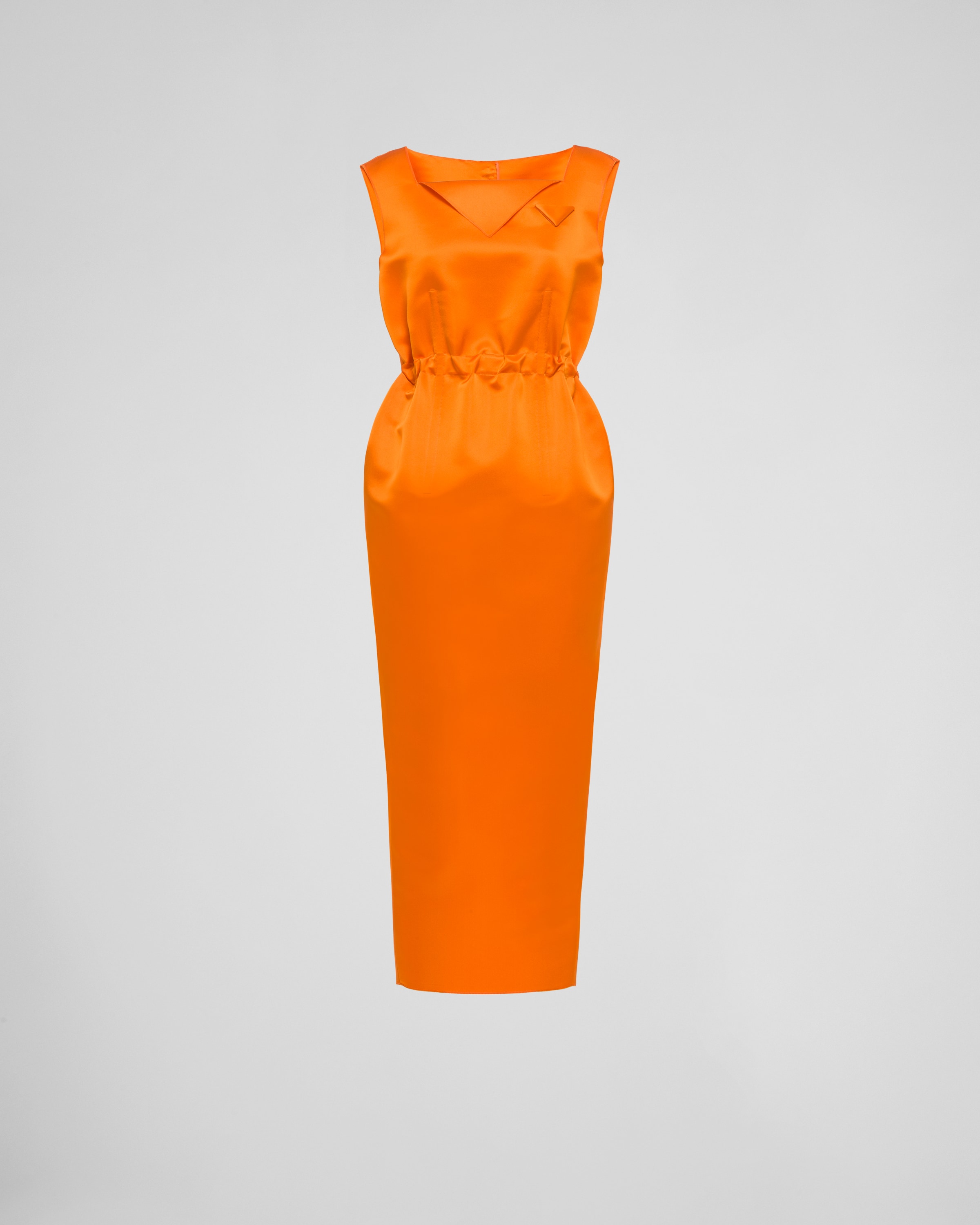 Arriba 49+ imagen orange prada dress