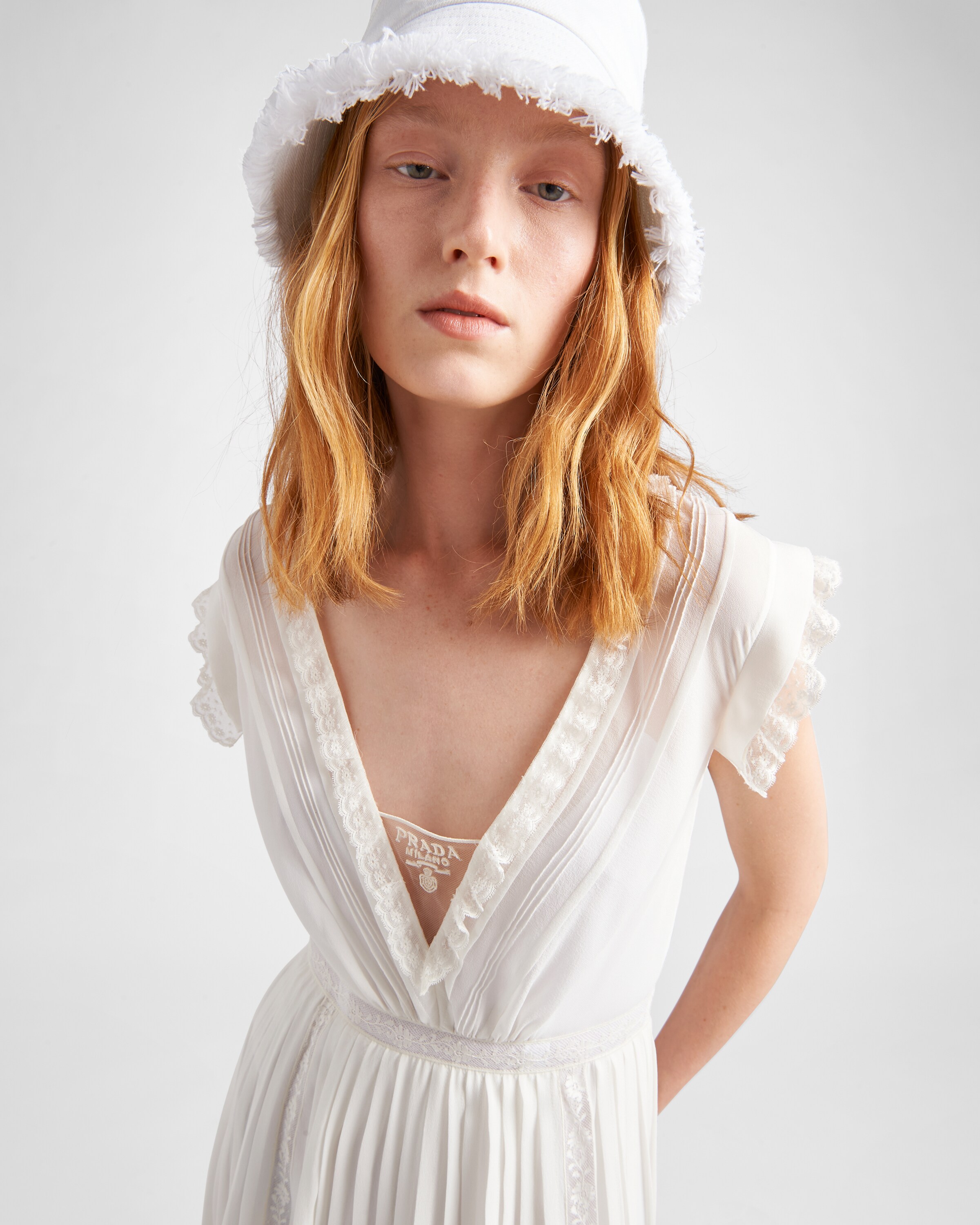 White Long dress with intarsia Prada