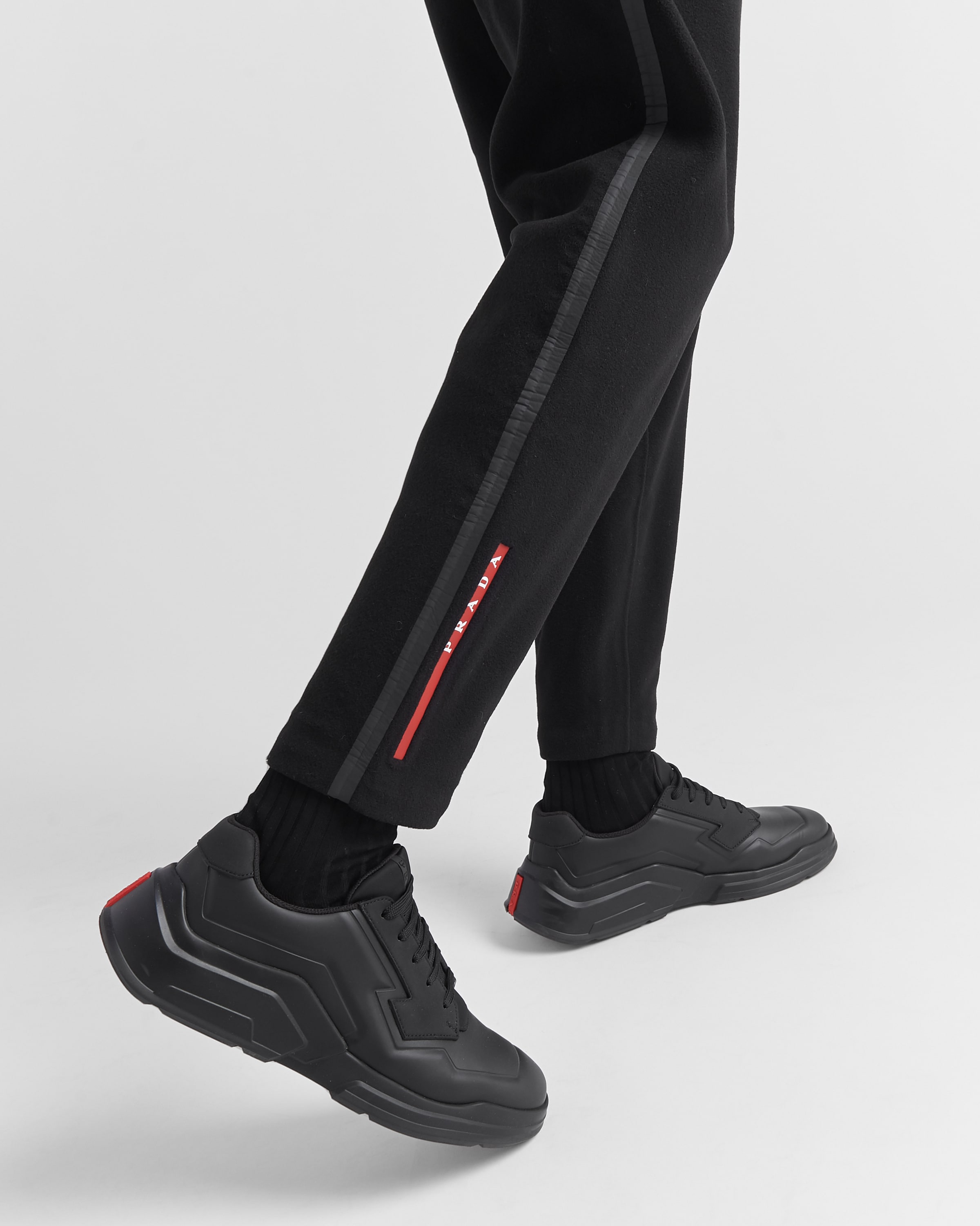 Prada linea sales rossa pants
