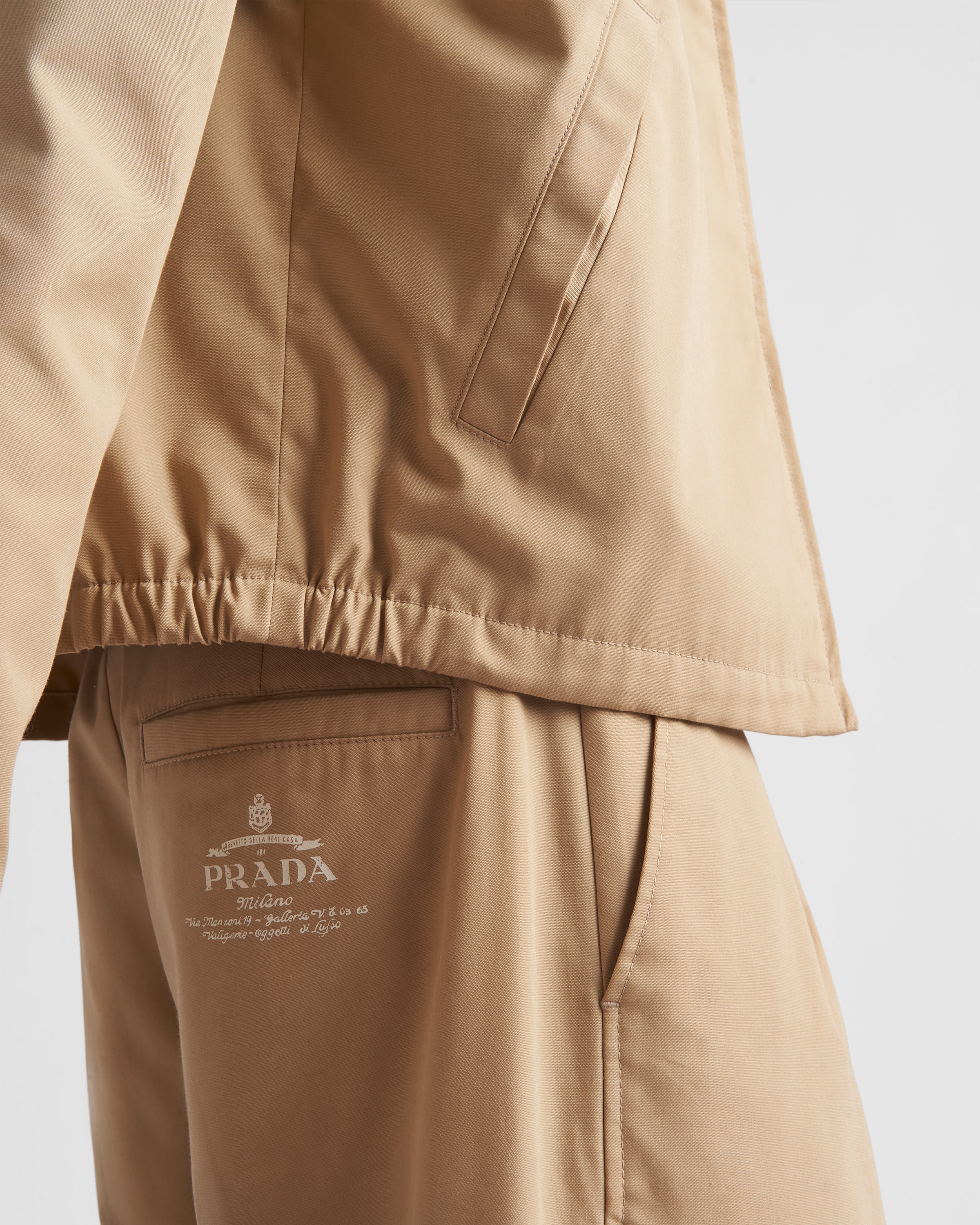 Prada Mens Neutral Poplin-textured Pleated Shell Shorts In Desert Beige