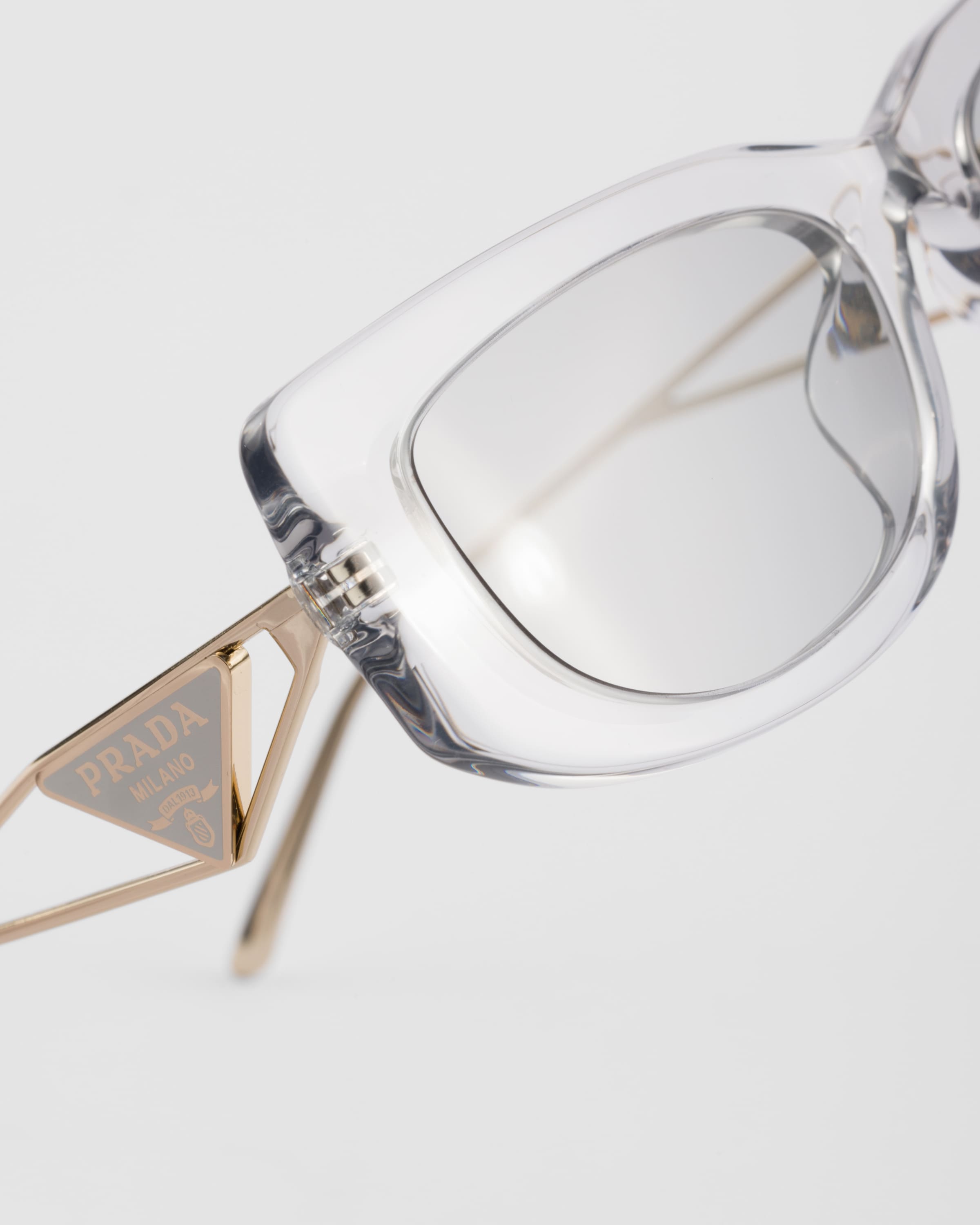 Prada Sunglasses With The Triangle Logo In Light Gray Lenses