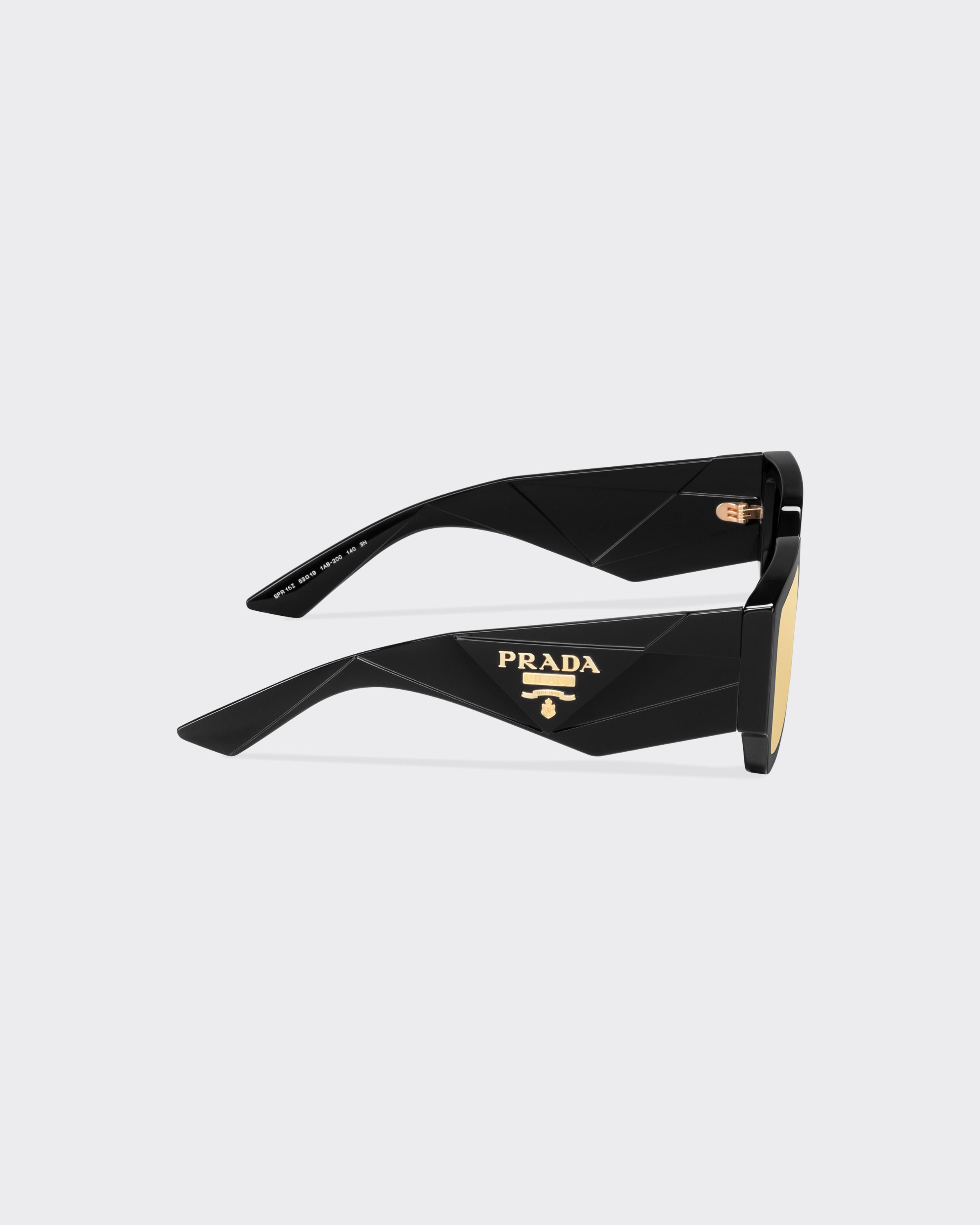 Black and gold shop prada sunglasses