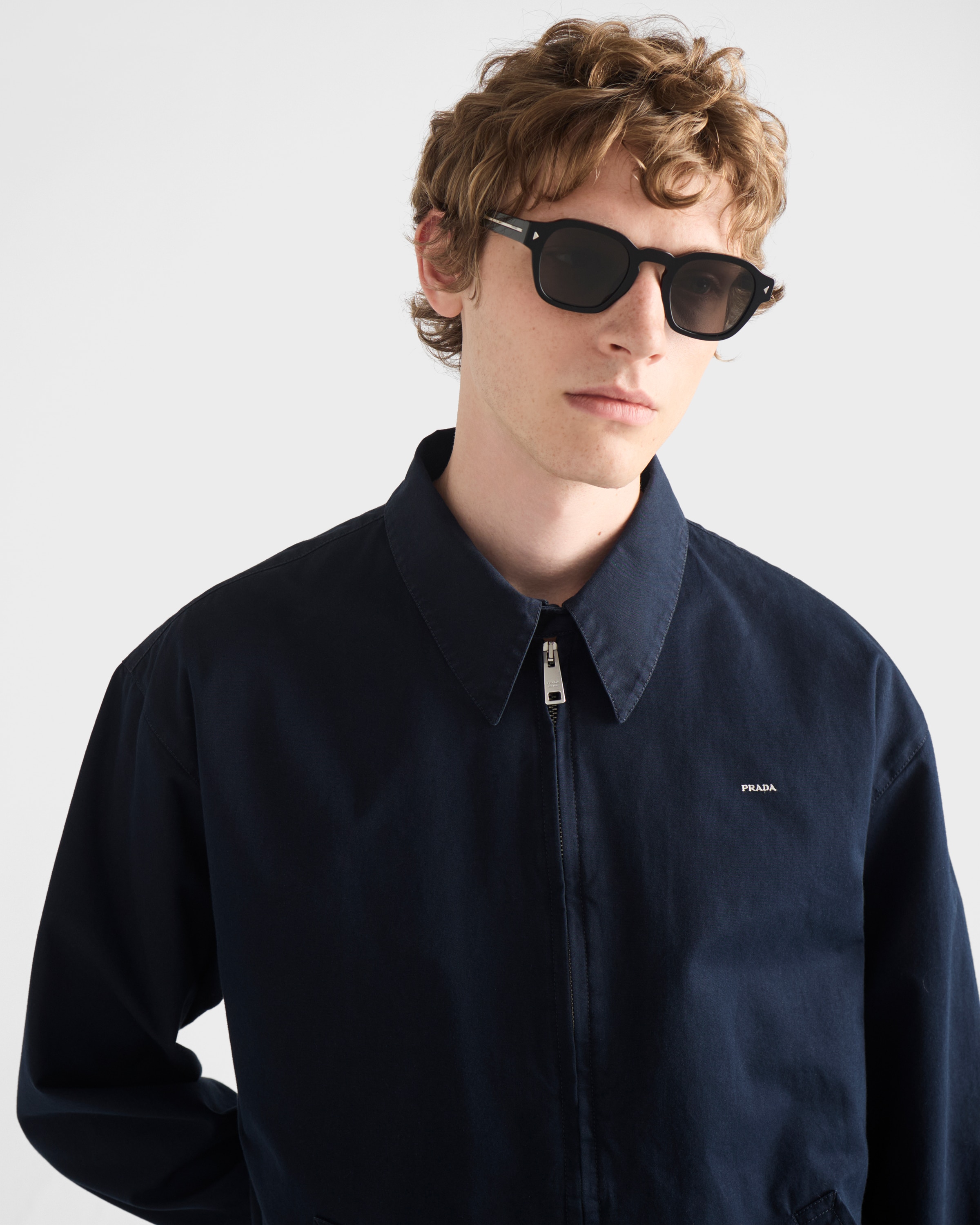 Sunglasses with the iconic metal plaque
