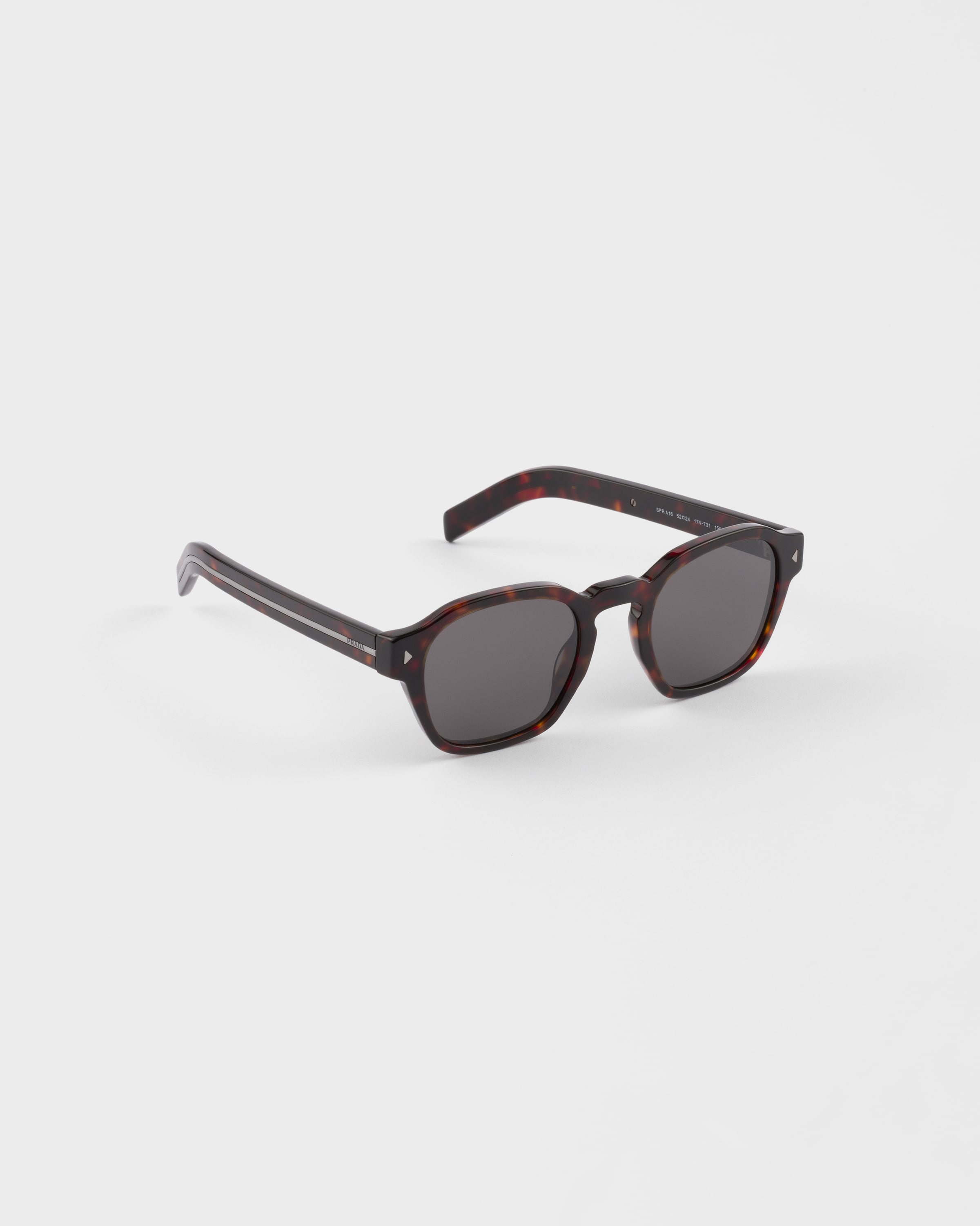 Prada Sunglasses With The Iconic Metal Plaque