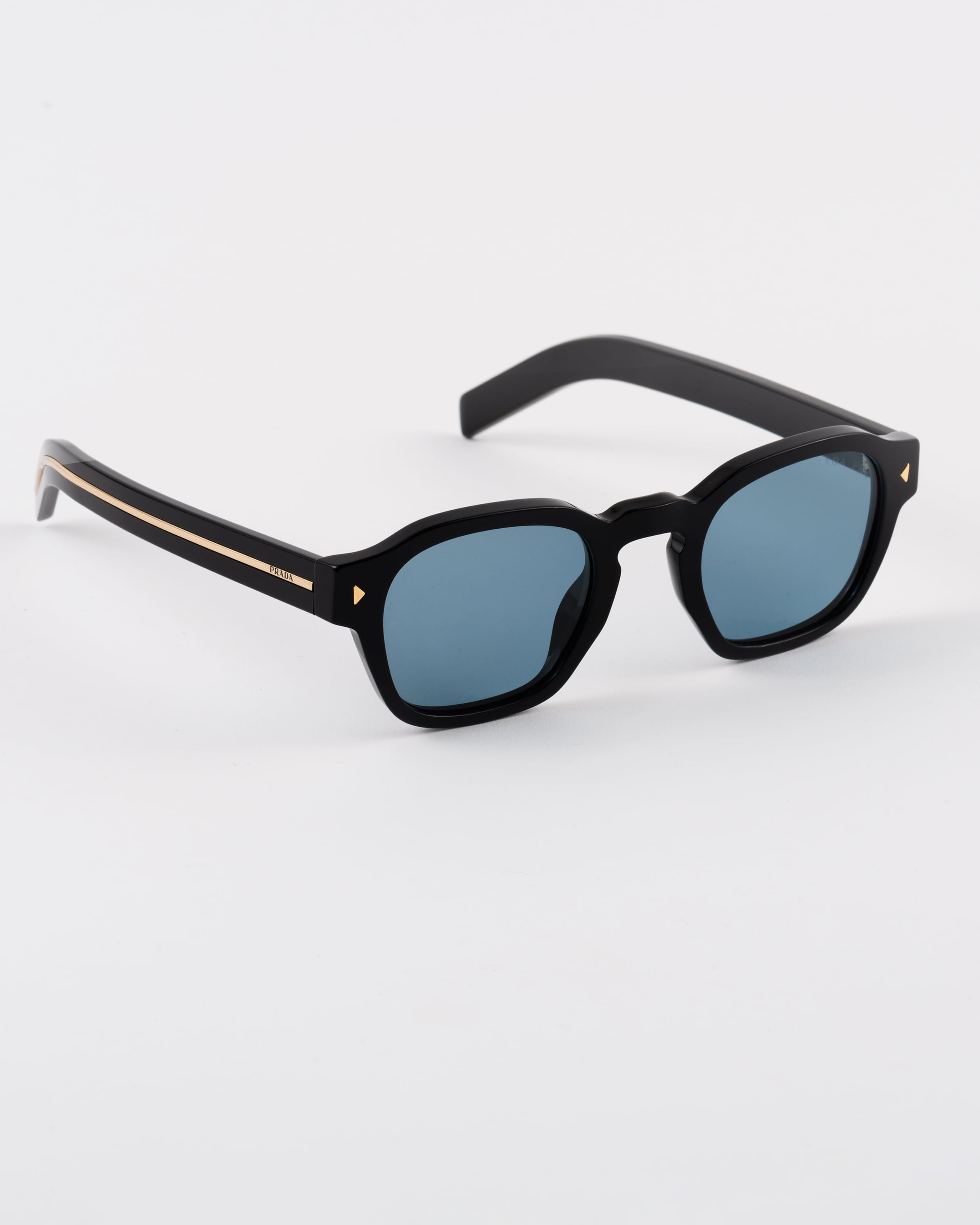 Prada Sunglasses With Iconic Metal Plaque In Turquoise Lenses