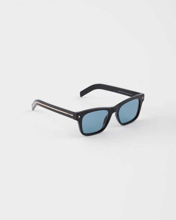 Occhiali da sole con Iconica Placca in metallo - Lenti Turchesi Occhiali da sole con Iconica Placca in metallo - Lenti Turchesi