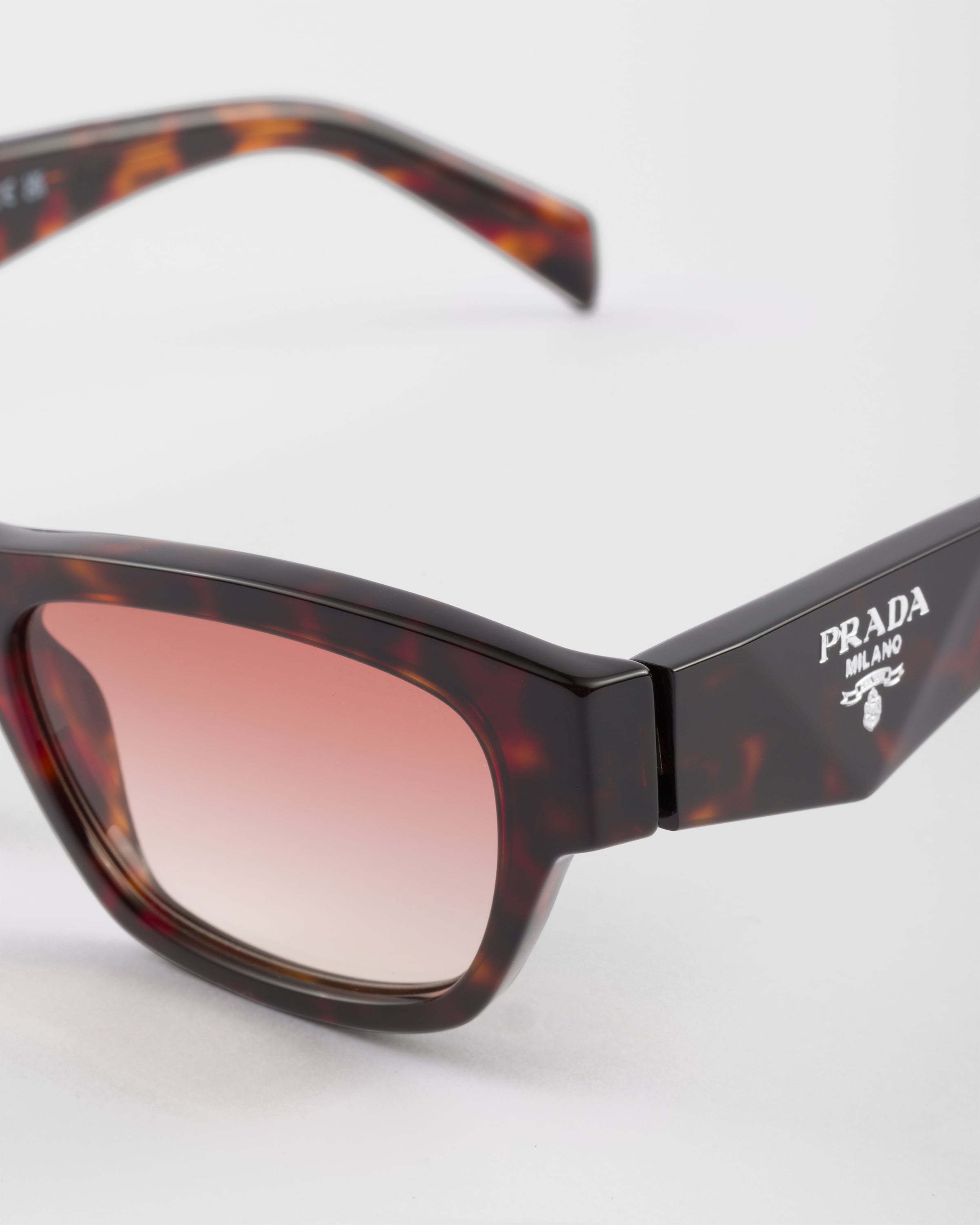 Prada Symbole Sunglasses In Gradient Powder Pink Lenses