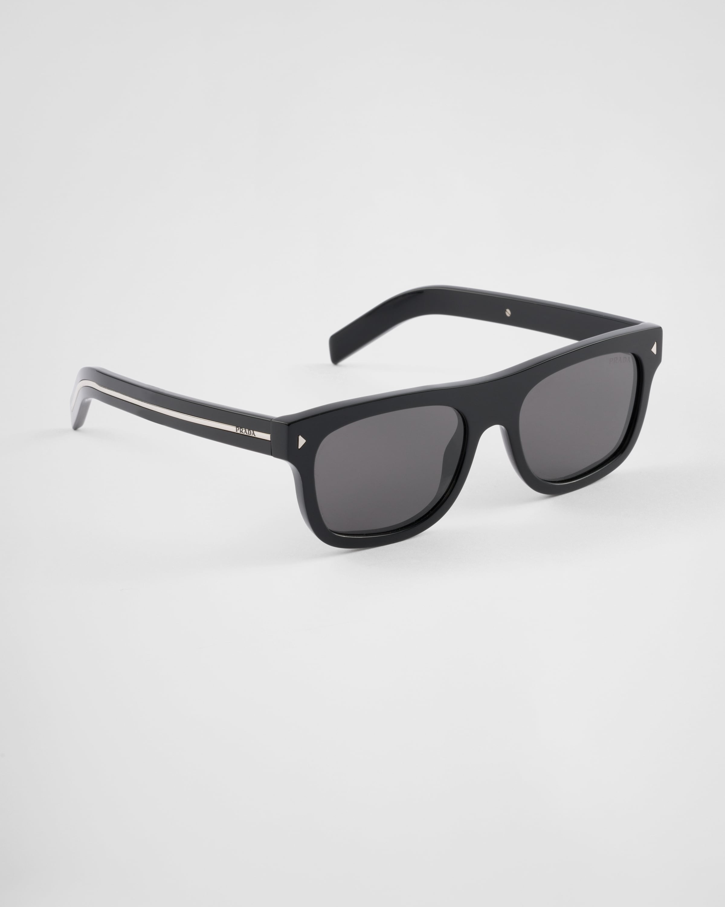 Prada Sunglasses With The Iconic Metal Plaque In Lenses Ardesia Crist