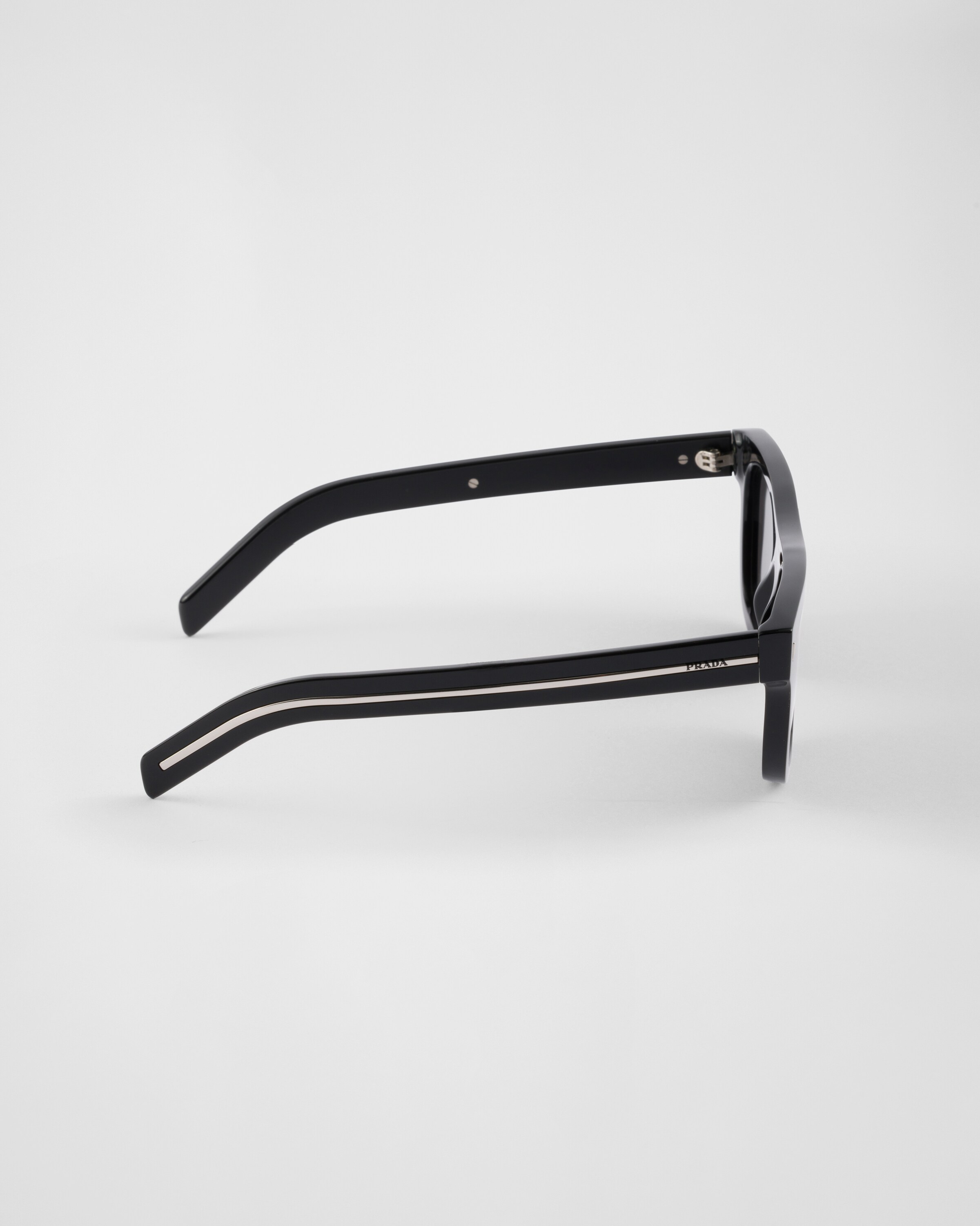 Prada Sunglasses With The Iconic Metal Plaque In Lenses Ardesia Crist