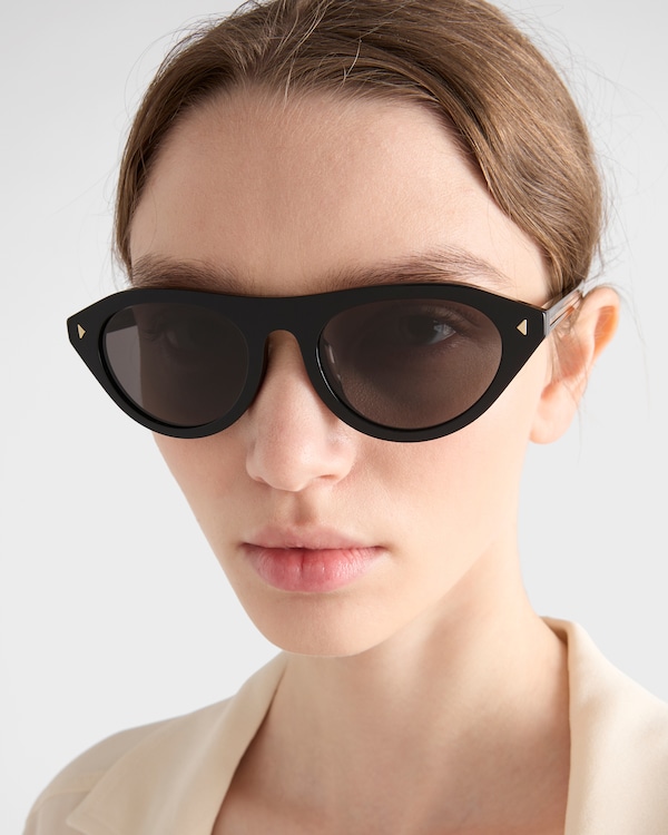 Prada sunglasses with the iconic metal plaque Prada sunglasses with the iconic metal plaque