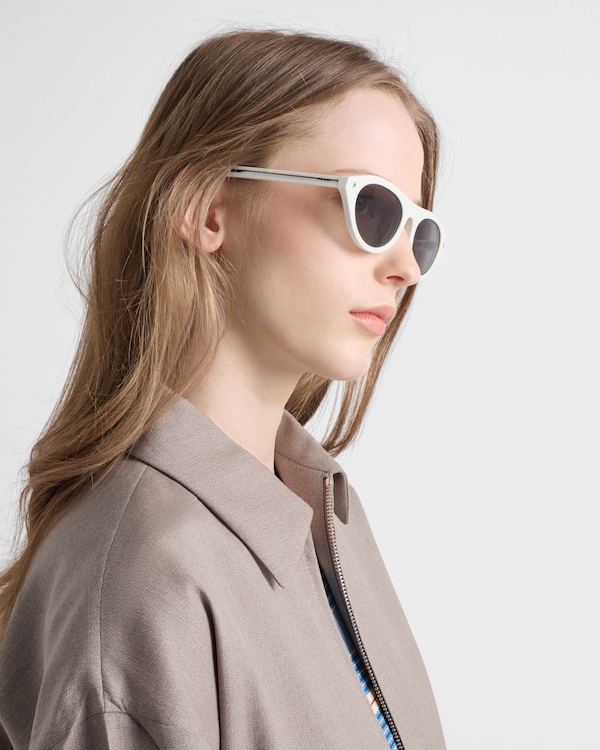Prada sunglasses with the iconic metal plaque - Gray lenses Prada sunglasses with the iconic metal plaque - Gray lenses