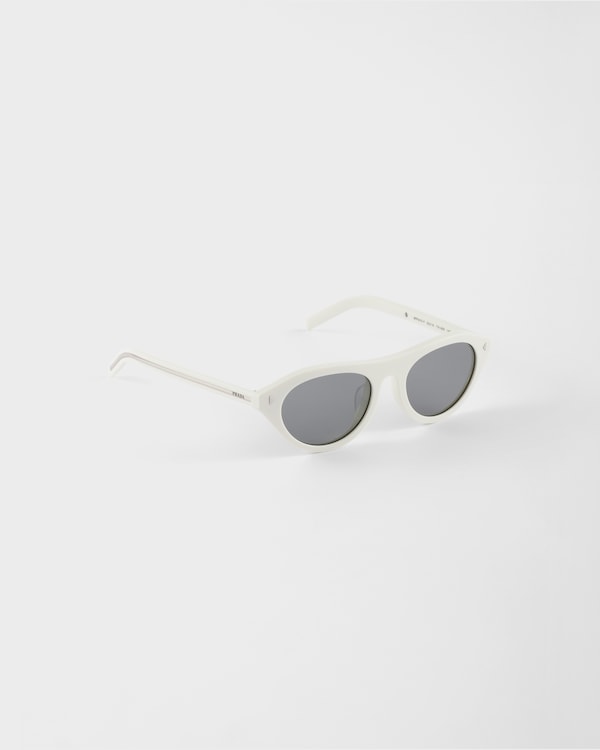 Prada sunglasses with the iconic metal plaque - Gray lenses Prada sunglasses with the iconic metal plaque - Gray lenses