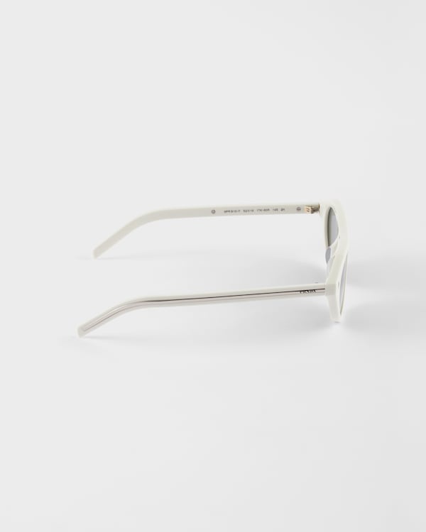 Prada sunglasses with the iconic metal plaque - Gray lenses Prada sunglasses with the iconic metal plaque - Gray lenses